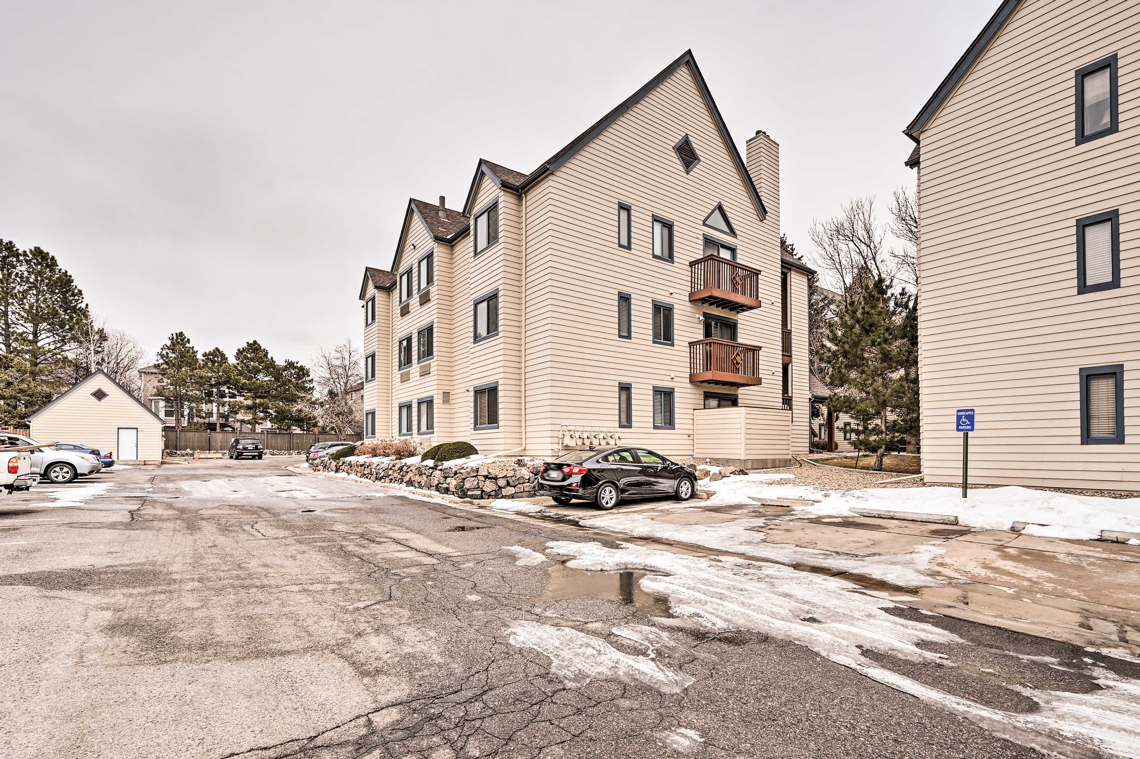 Property Exterior | Community Parking Lot (2 Vehicles)