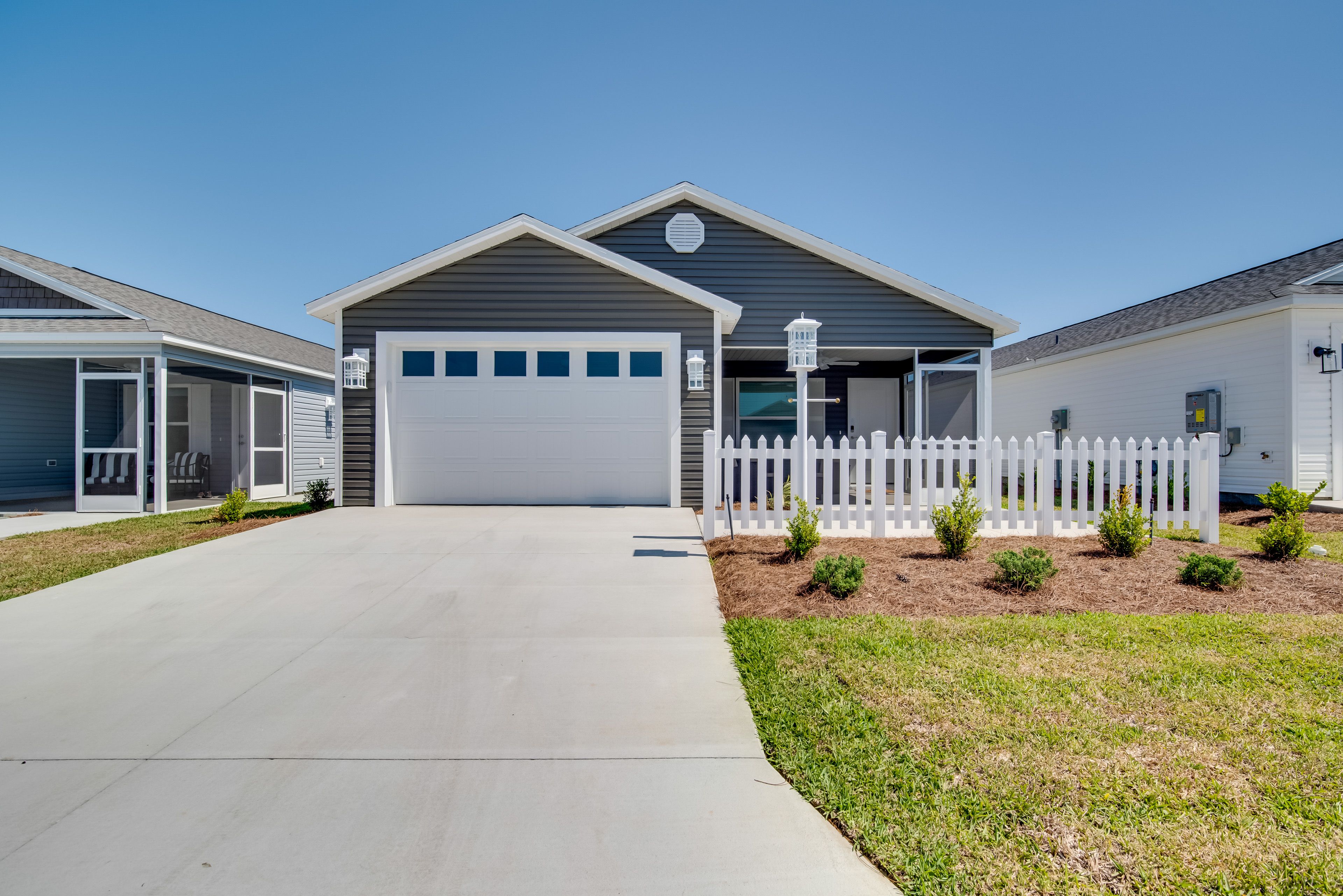 Parking | Driveway (1 Vehicle, 1 Golf Cart) | Garage (1 Vehicle)