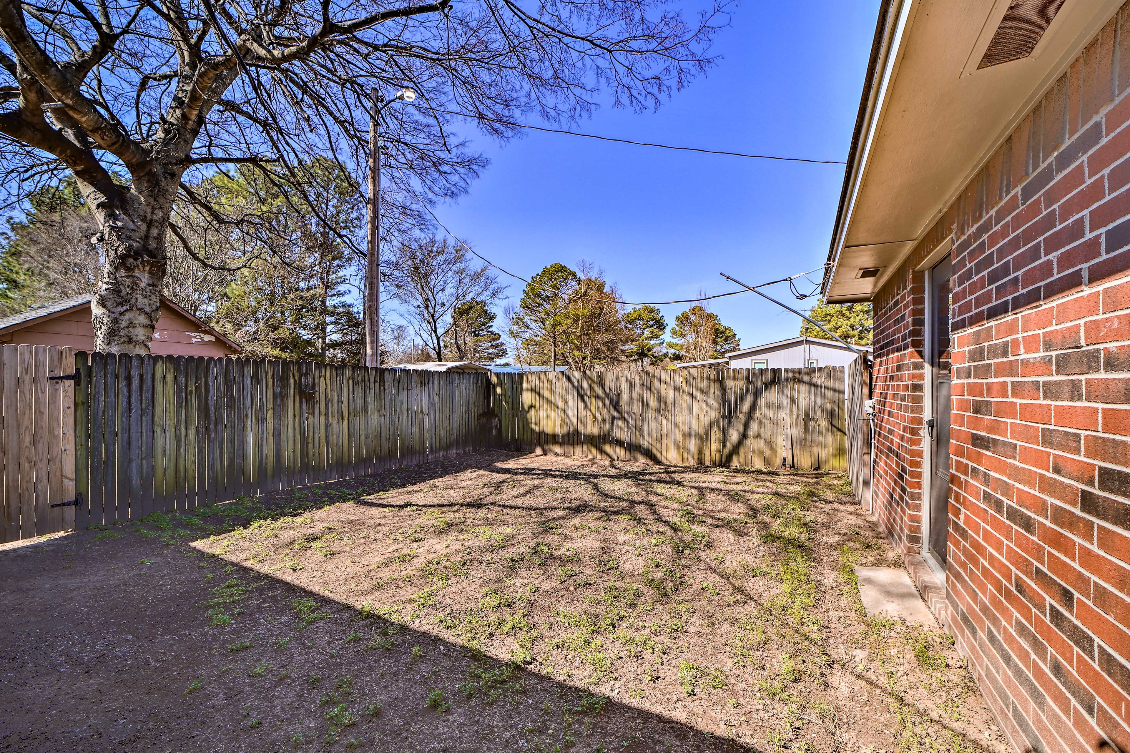 House Exterior | Fenced Courtyard