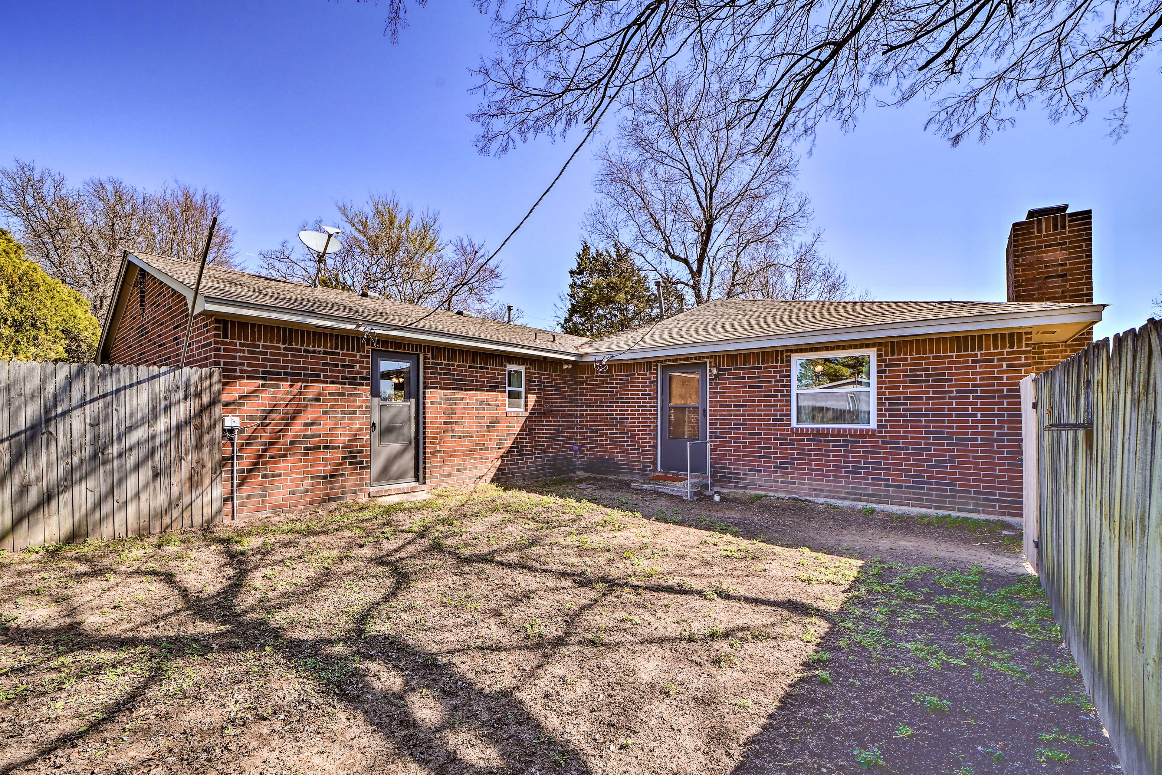 House Exterior | Fenced Courtyard