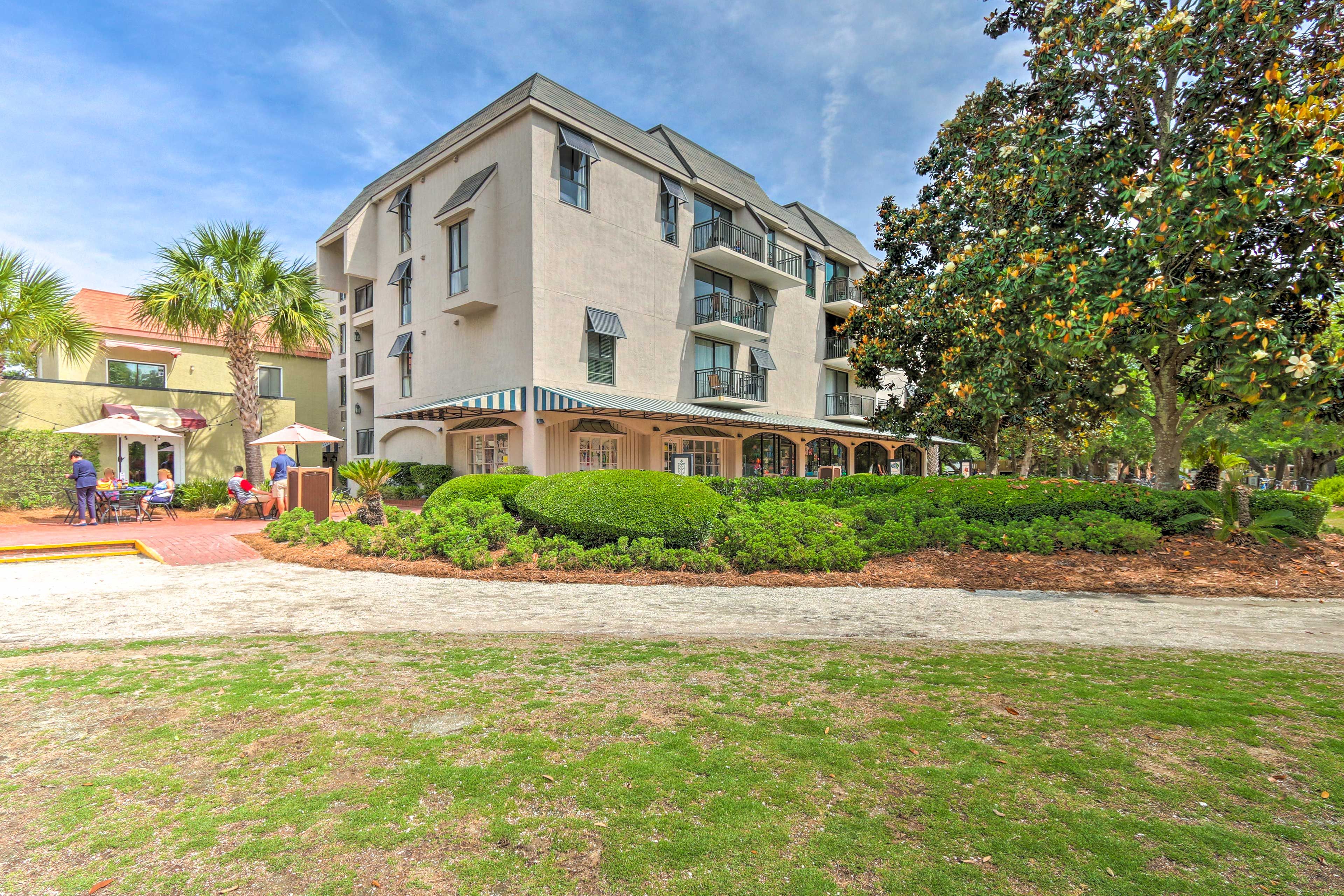 Condo Exterior | Open Community Parking Lot