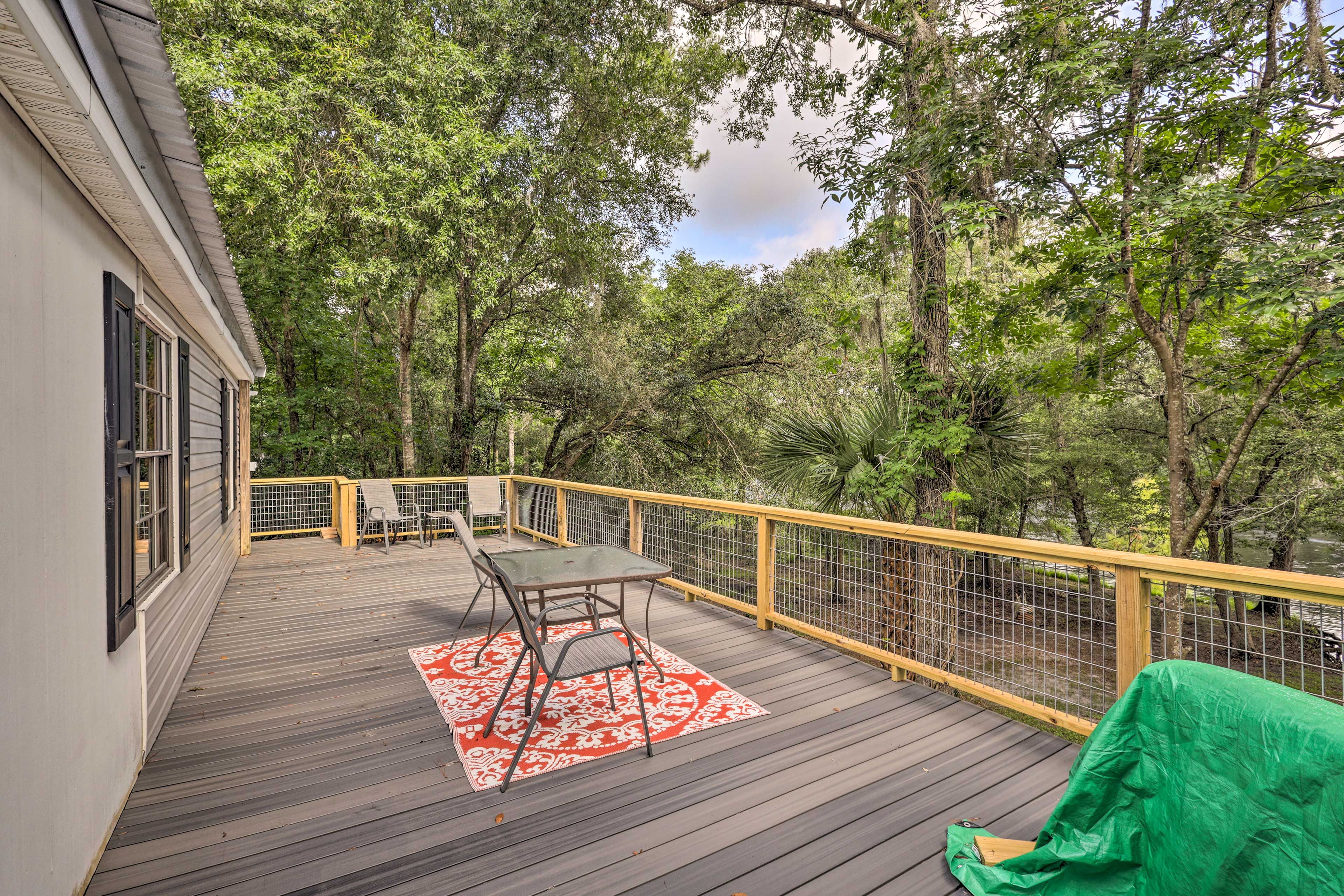 Private Deck | Covered Patio w/ Grill | Suwannee River Views & Access