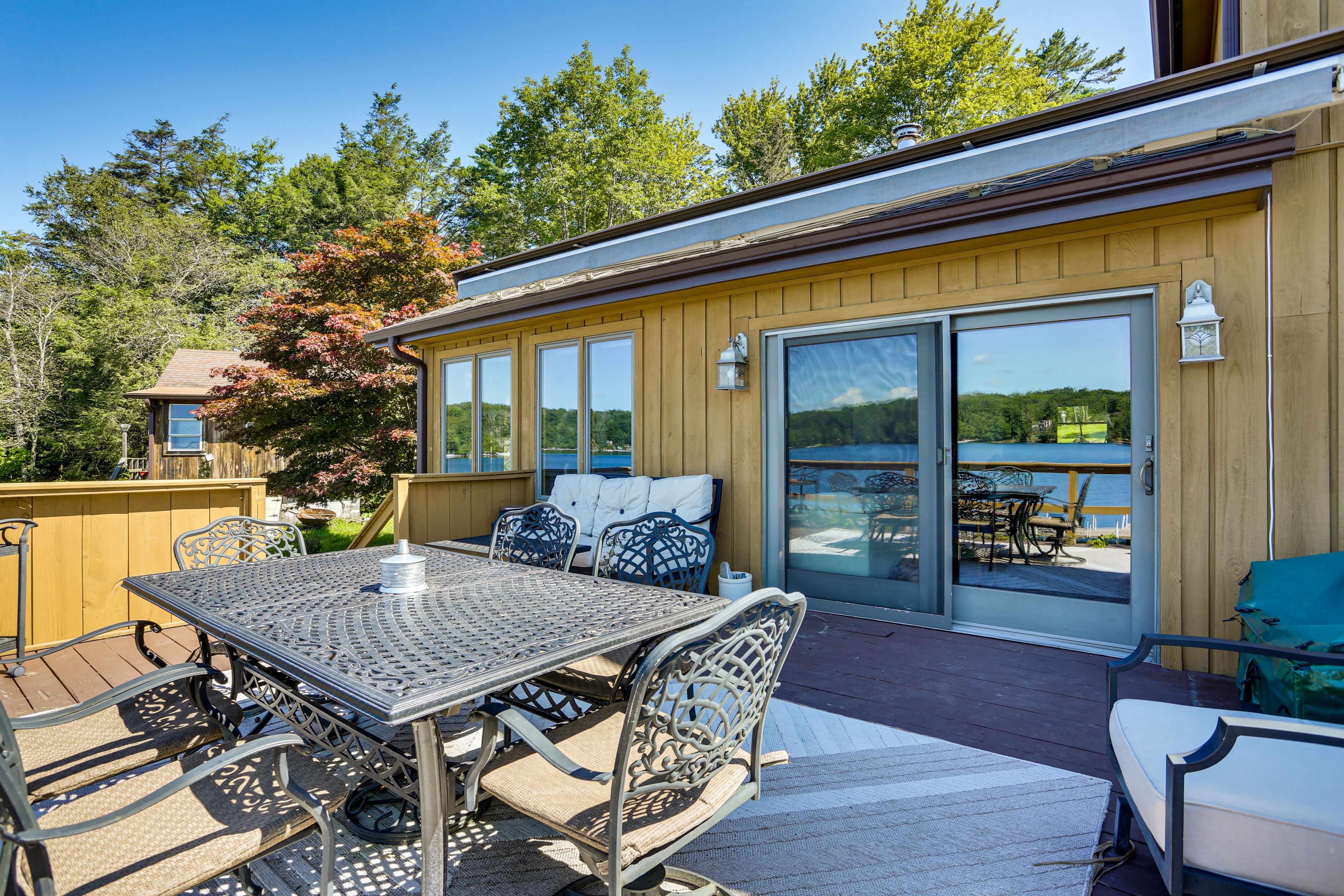 Furnished Deck | Dining Area | Lake Views