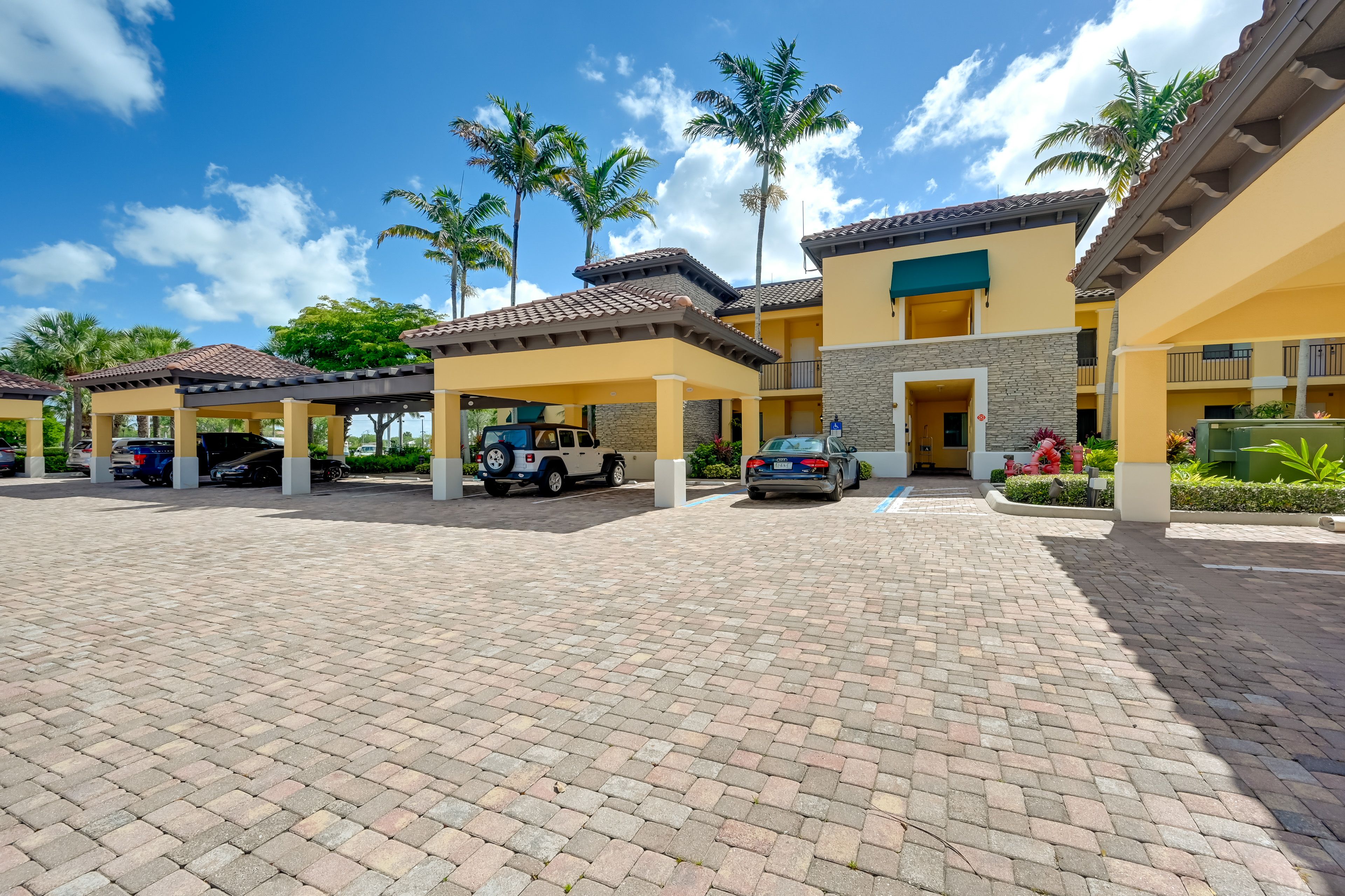 Building Exterior | Community Parking Lot (2 Vehicles)