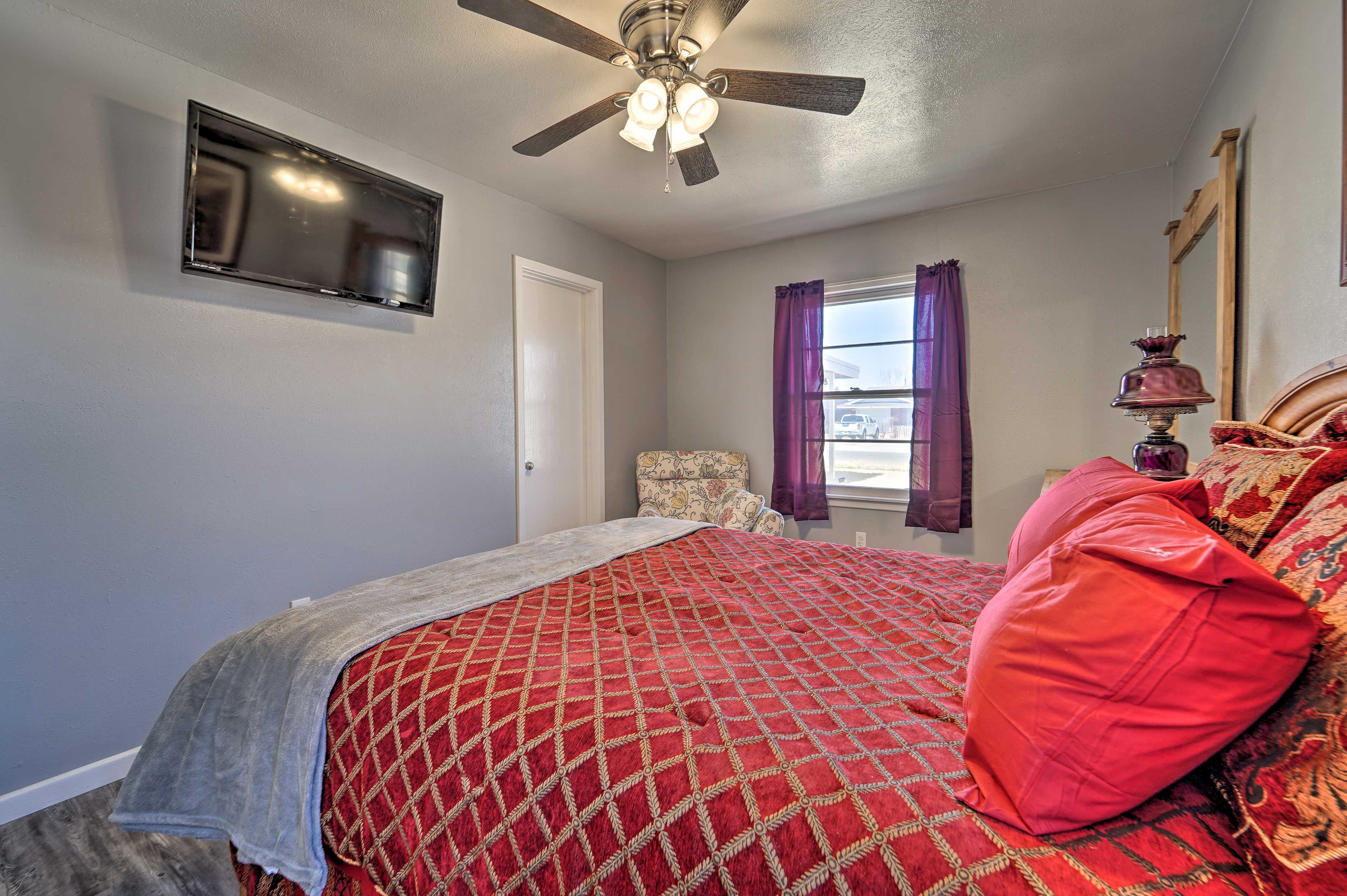 Bedroom 1 | Flat-Screen Cable TV | Linens Provided