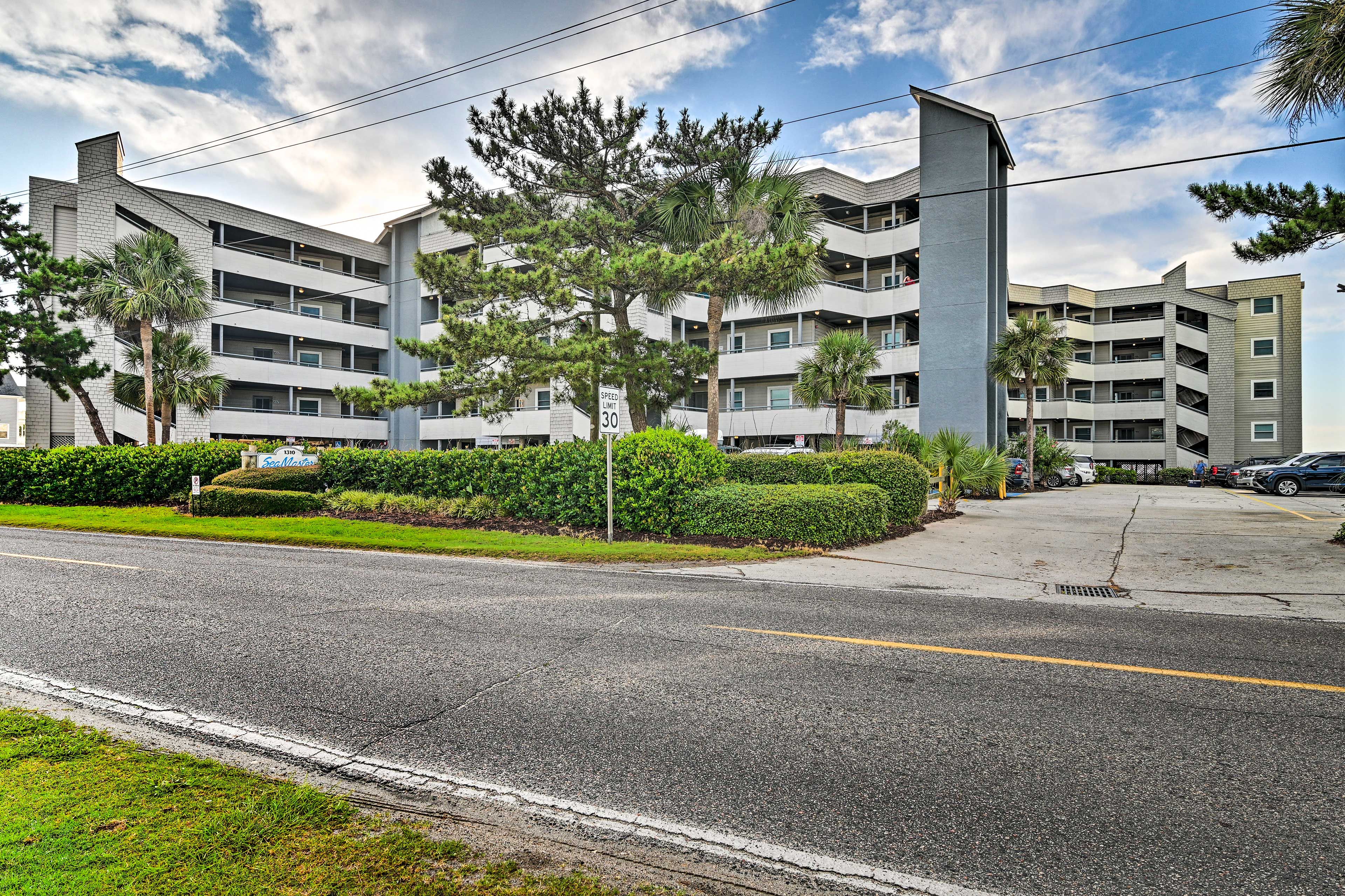 Parking | Covered Community Lot (2 Vehicles) | Overflow Parking Next to Building