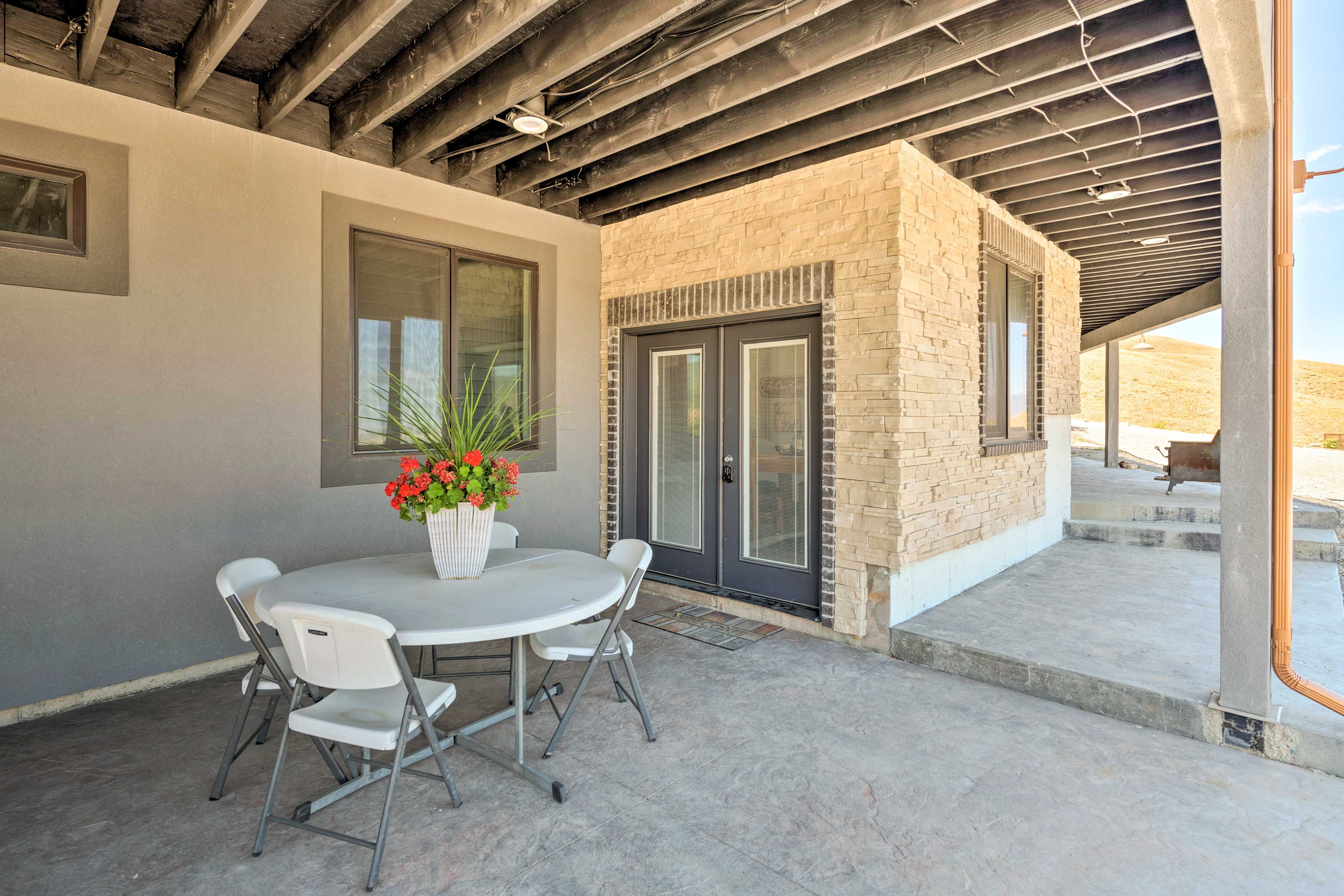 Patio | Homeowner/Another Vacation Rental On-Site | 2 Exterior Security Cameras