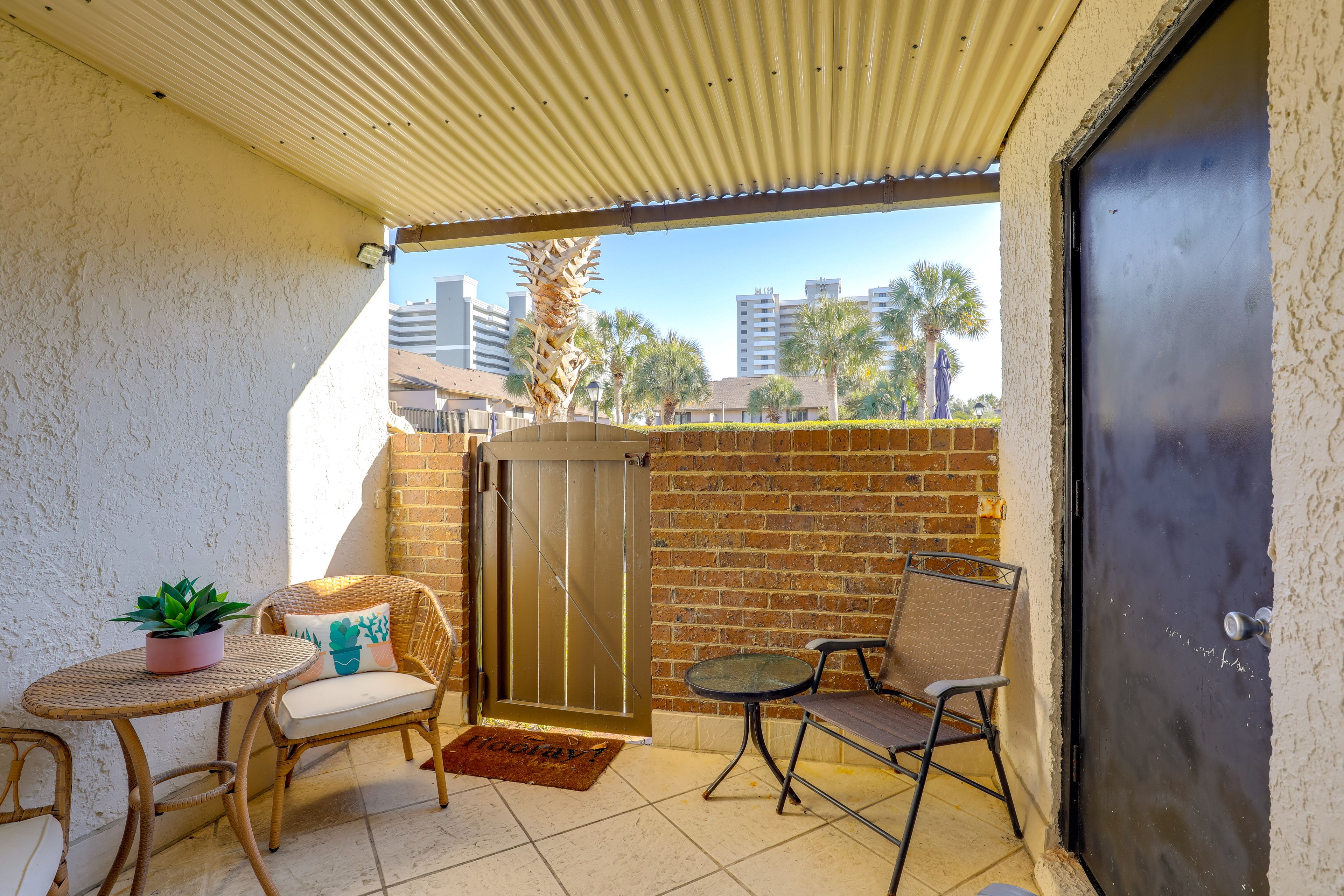Enclosed Patio | Beach Chairs & Umbrella