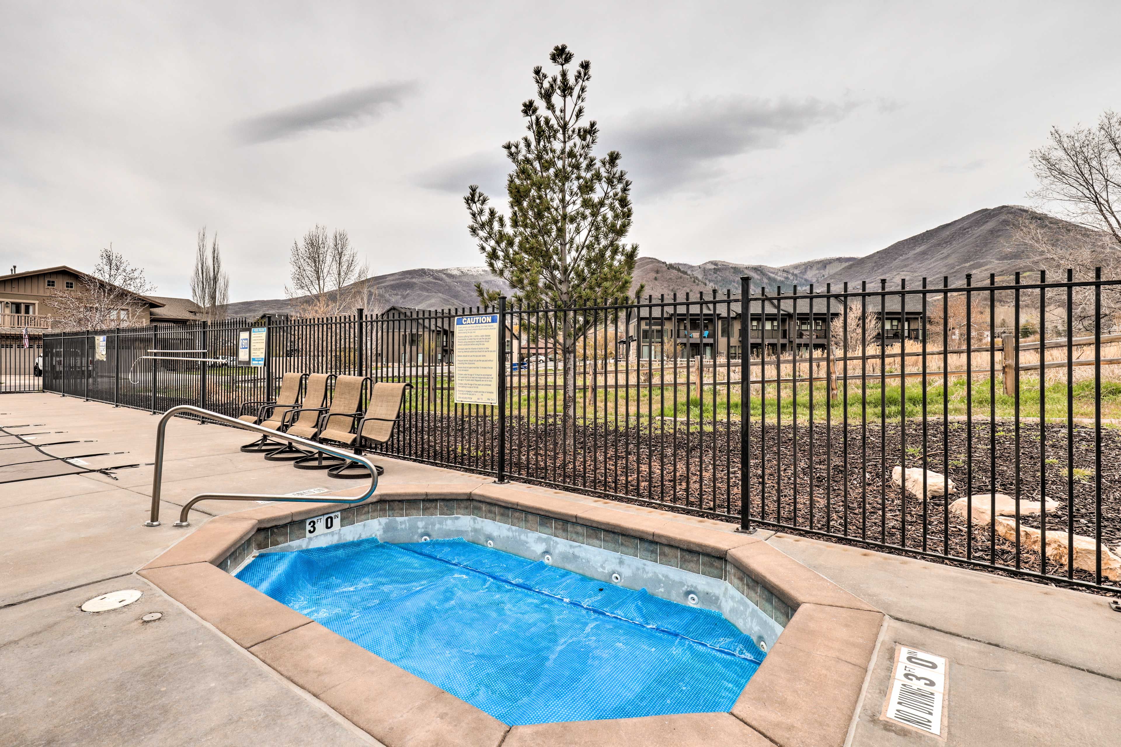 Townhome Exterior | Community Hot Tub
