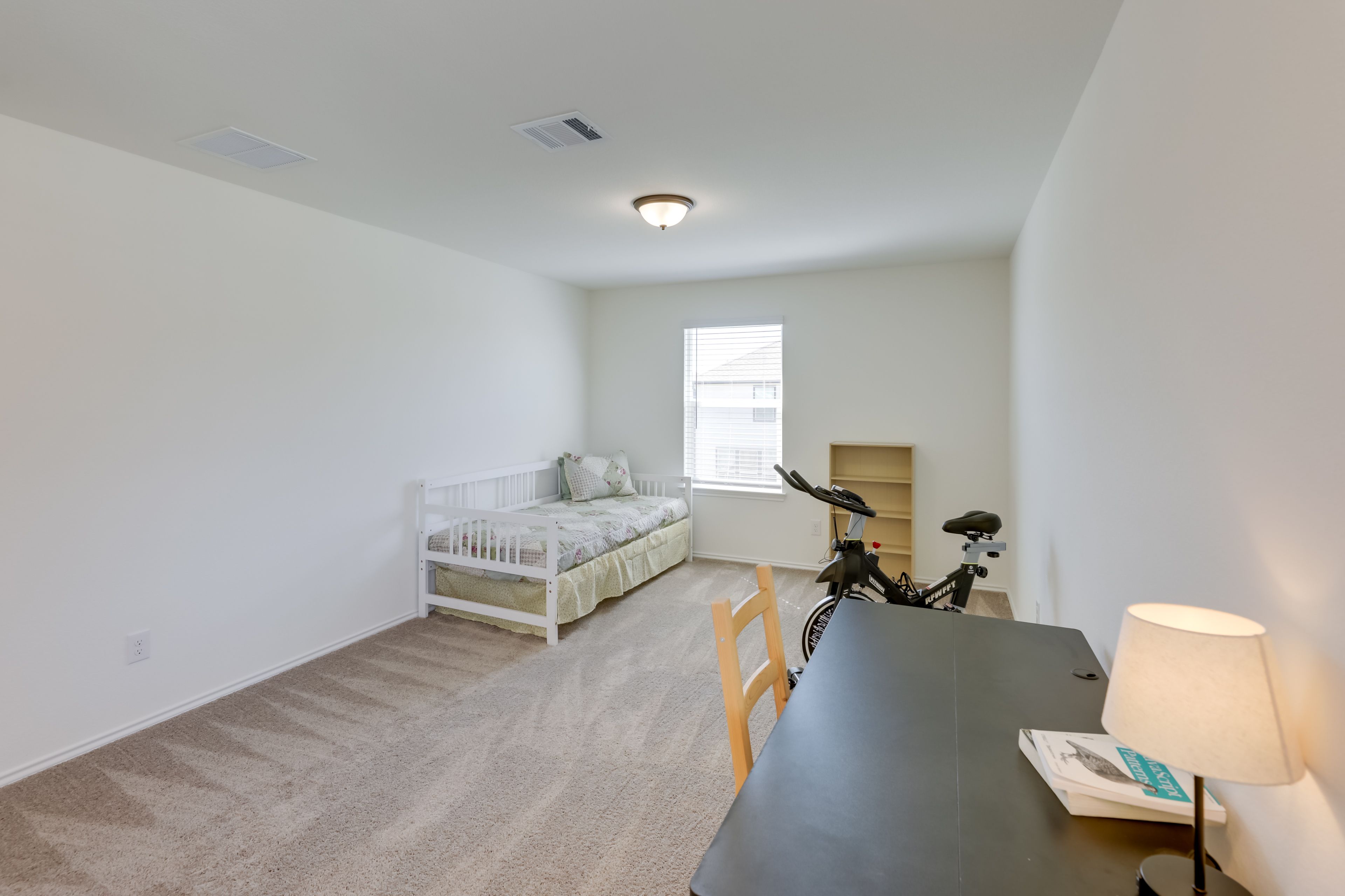 Office Space | Twin Daybed | Adjustable Standing Desk | Exercise Bike