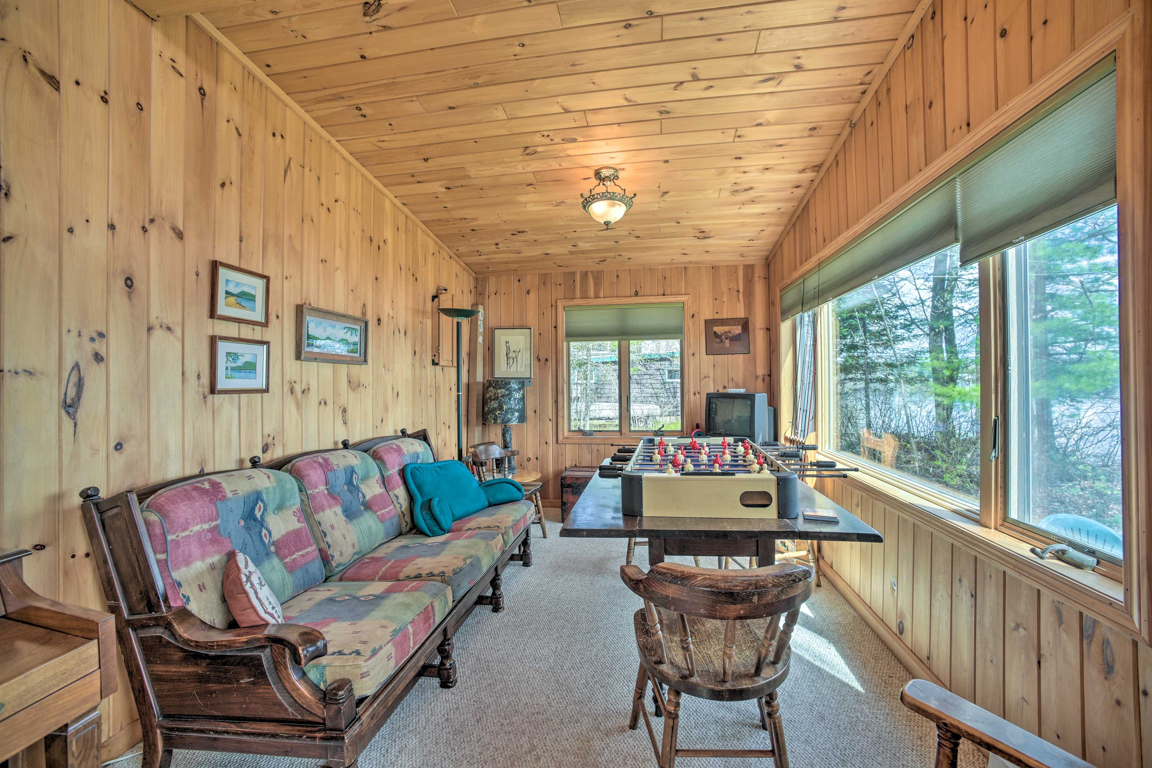 Living Room | Foosball Table | TV | Fishing Poles | Piano | Games | 1st Floor
