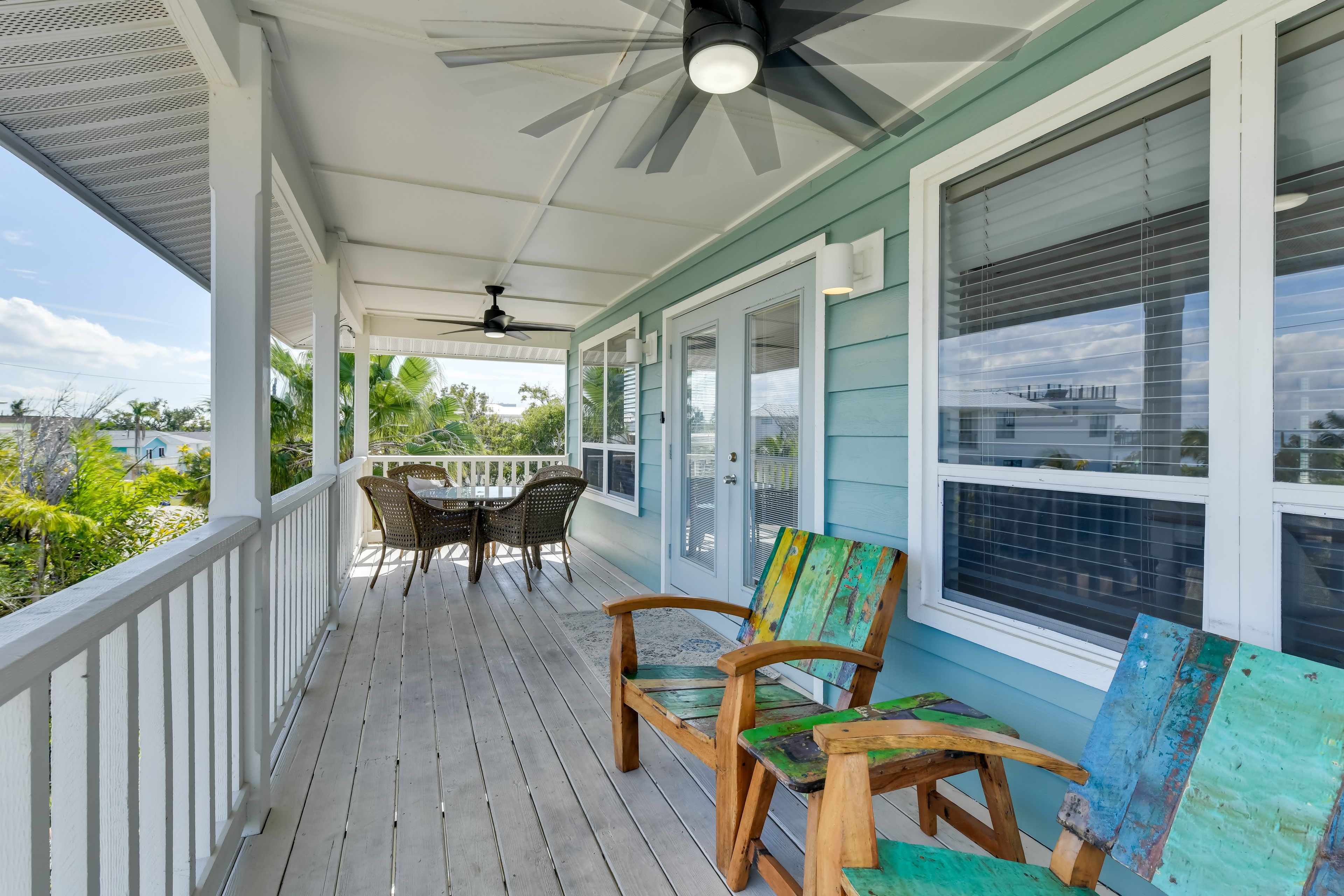 Covered Deck | Outdoor Dining | Peek-a-Boo Ocean Views