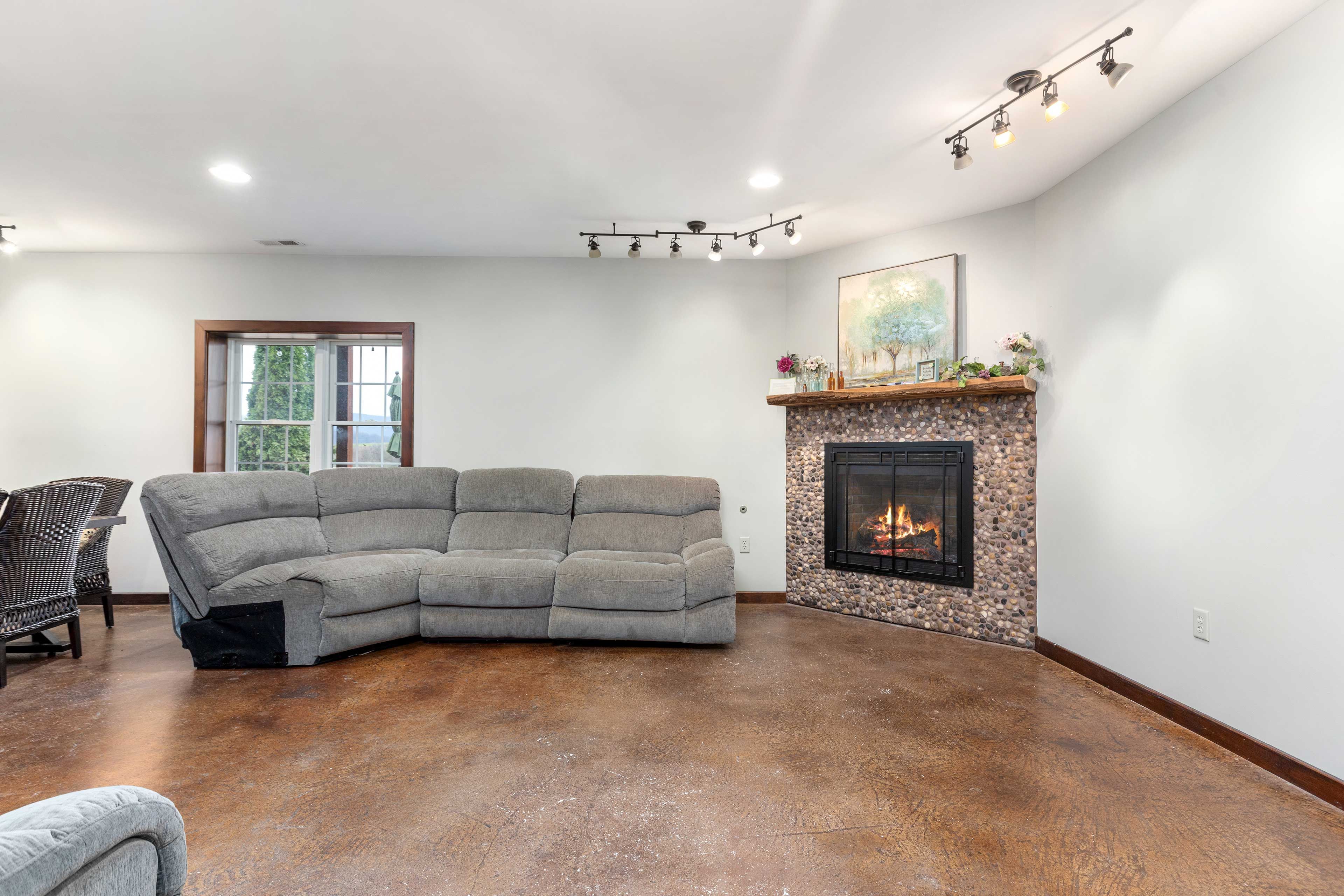 Living Room | Lower Level | Electric Fireplace