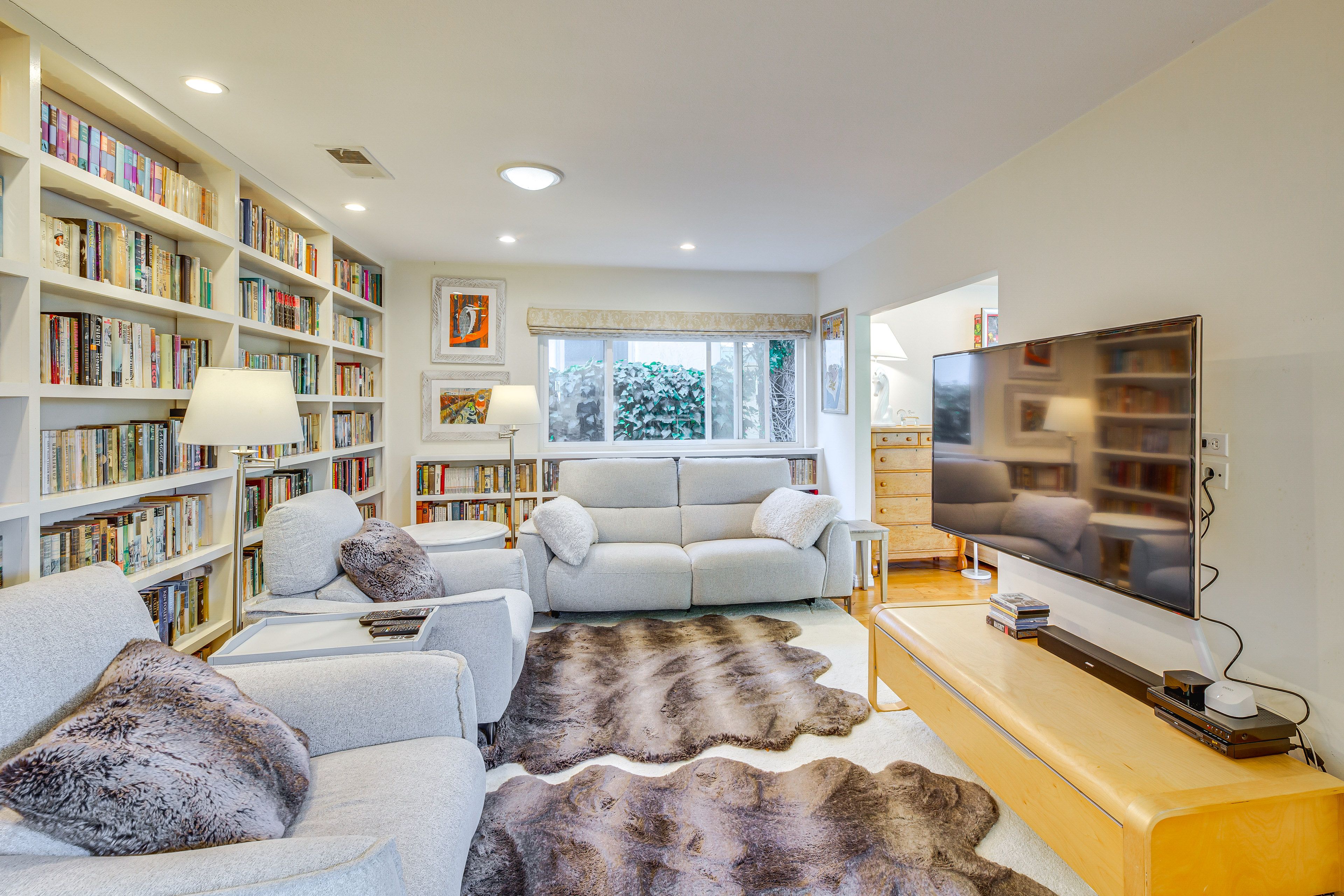 Den | Flat-Screen TV w/ Cable | Book Collection