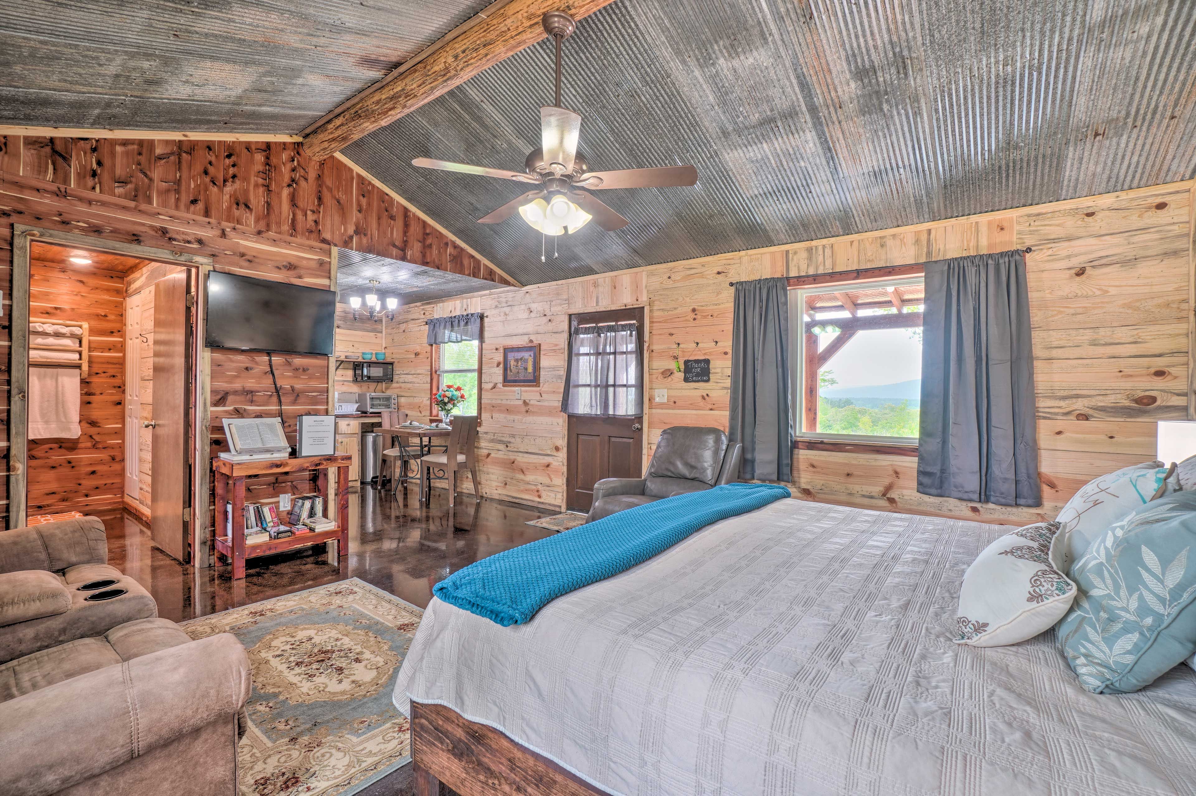 Studio | Sleeping Area | King Bed | Queen Air Mattress | Flat-Screen TV w/ Cable