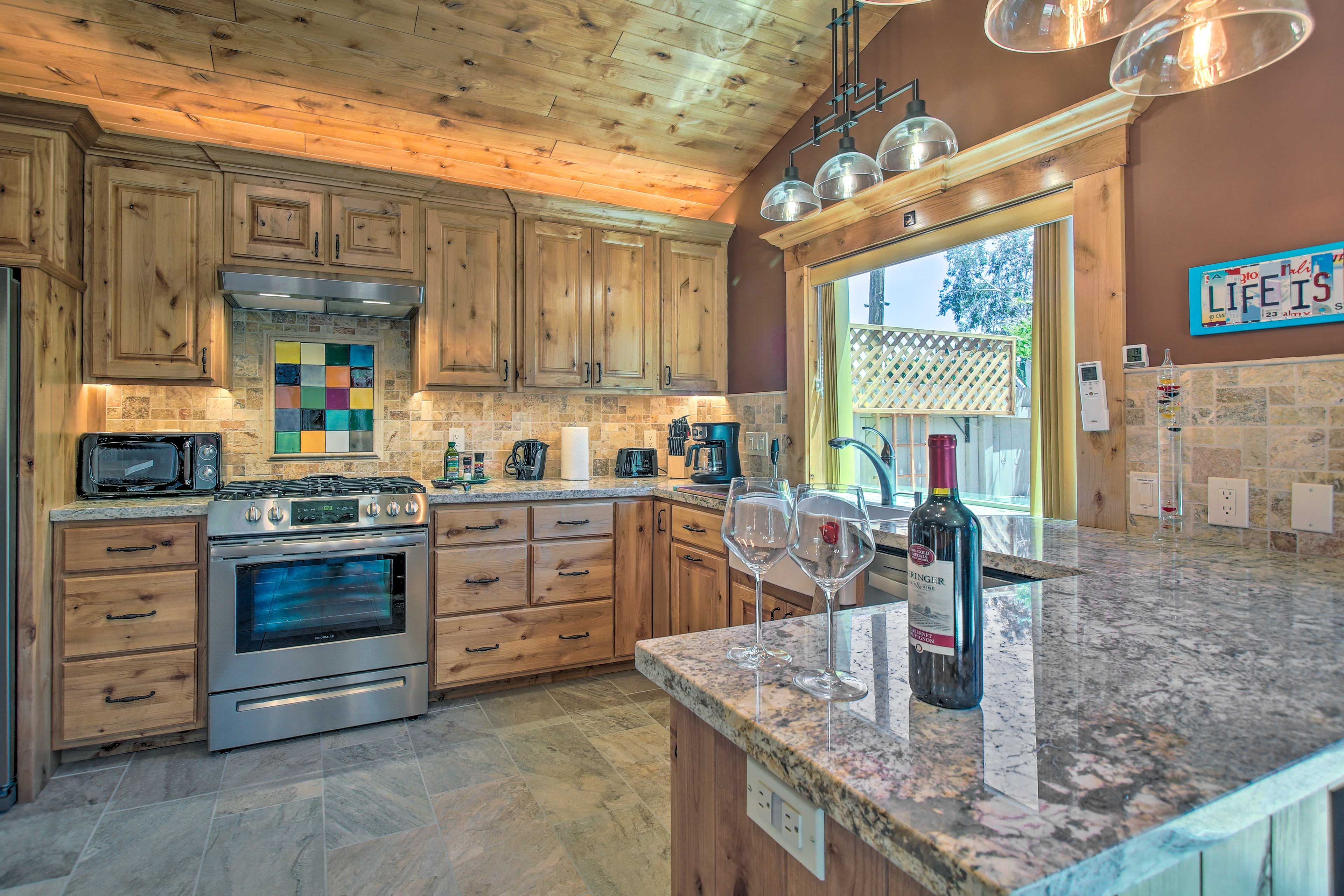 Kitchen | Dishwasher | Oven w/ Gas Stovetop | Dishware & Flatware
