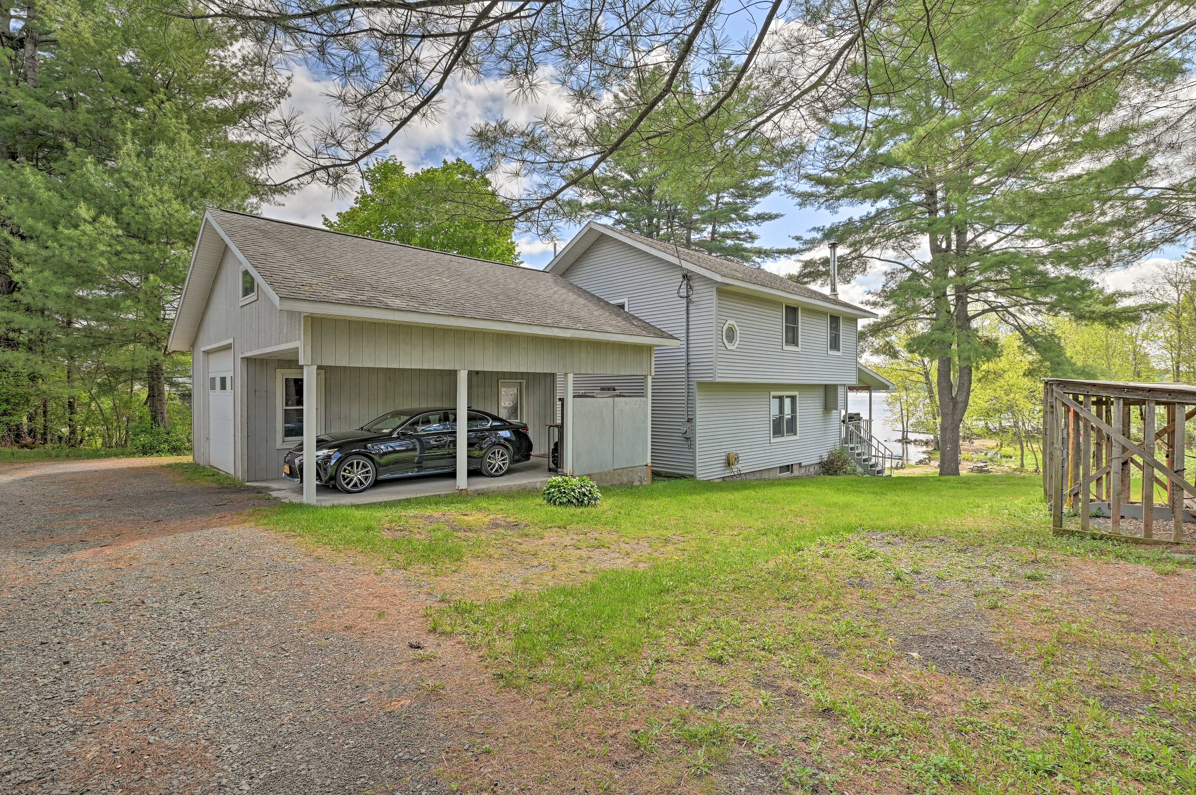Parking | Carport (1 Vehicle) | Driveway/Grass (5 Vehicles) | RV/Trailer