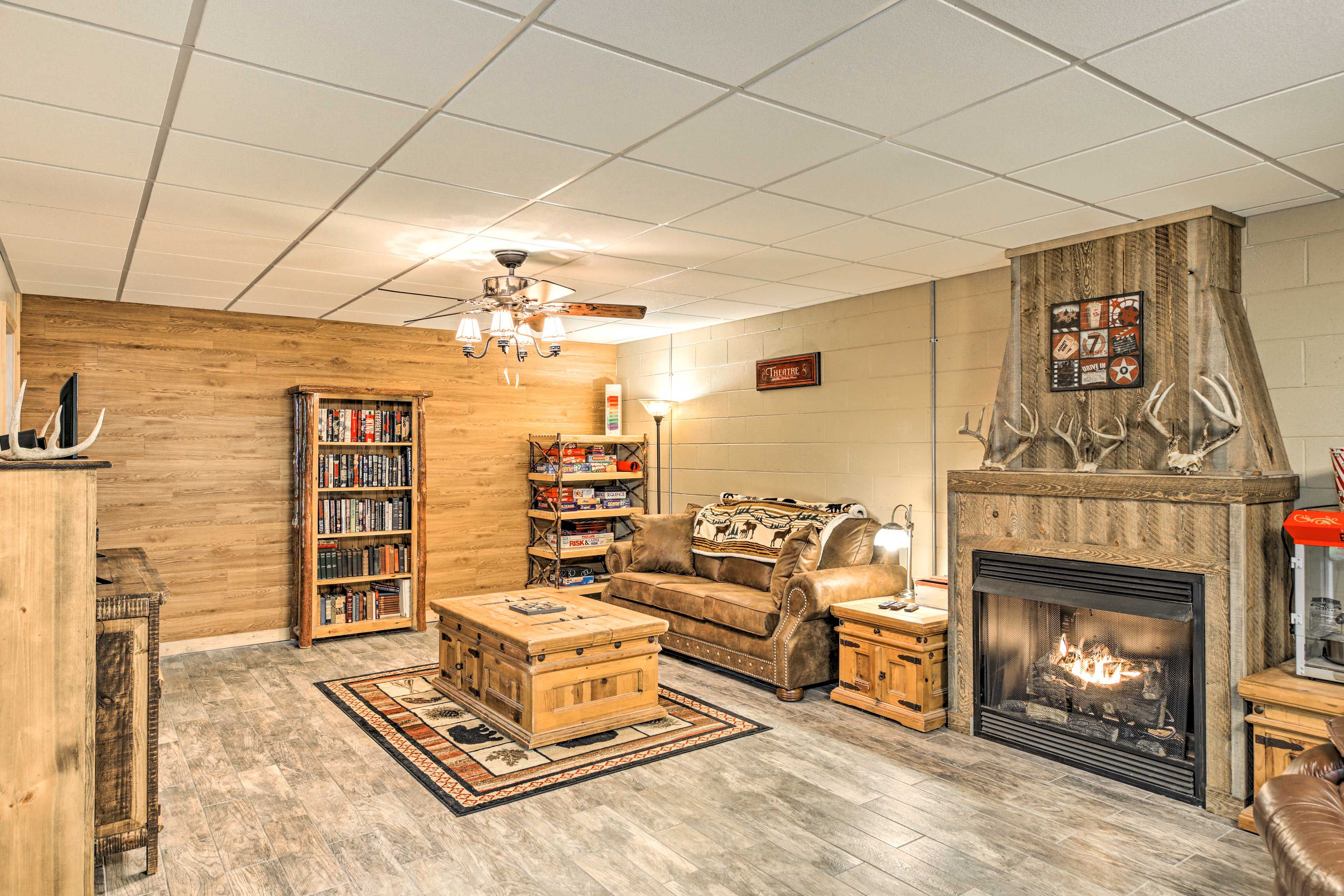 Game Room | Queen Sleeper Sofa | Fully-Stocked Movie Shelf