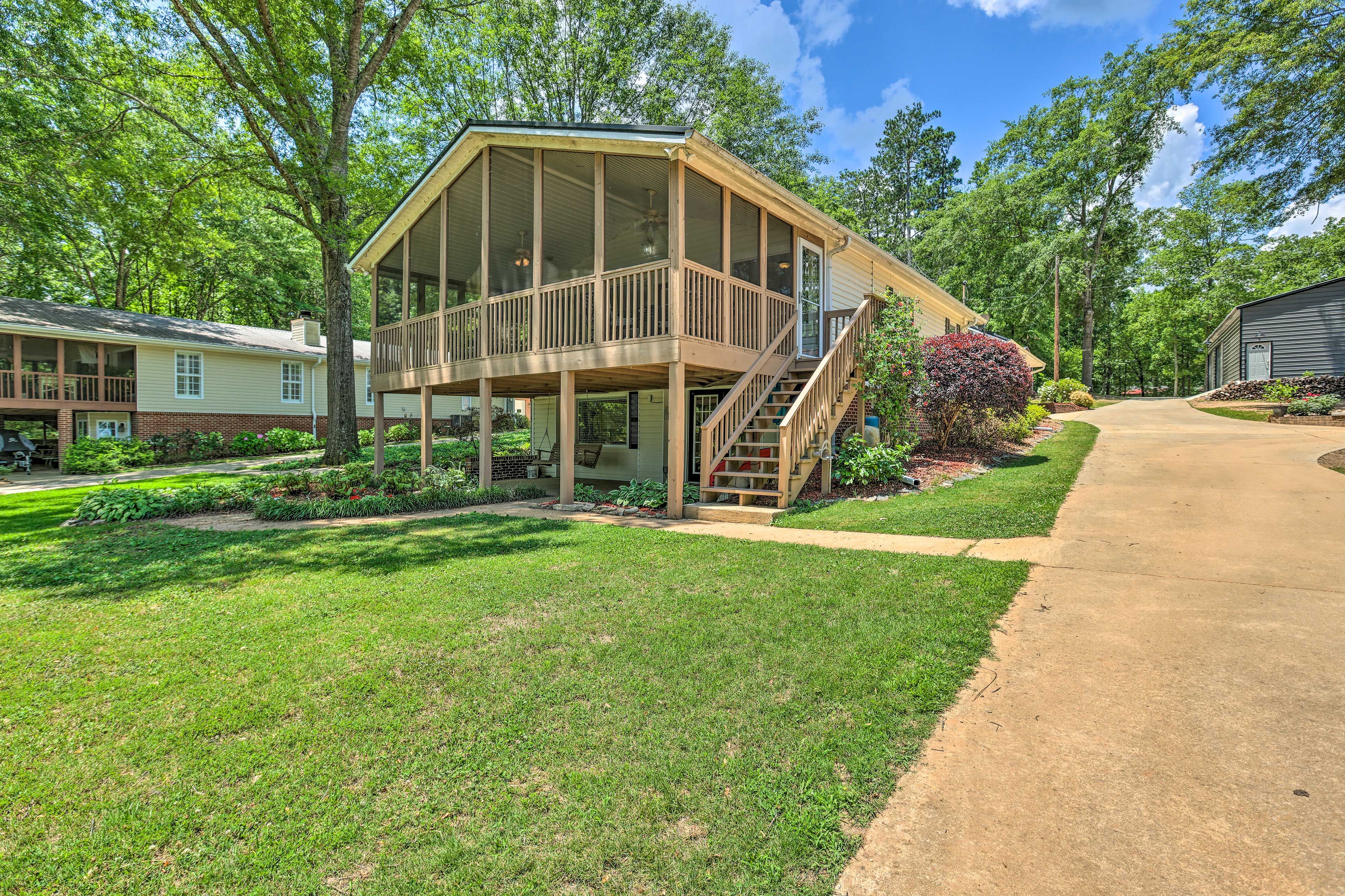 Exterior | Outdoor Dining Area | Porch Swing | Charcoal Grill