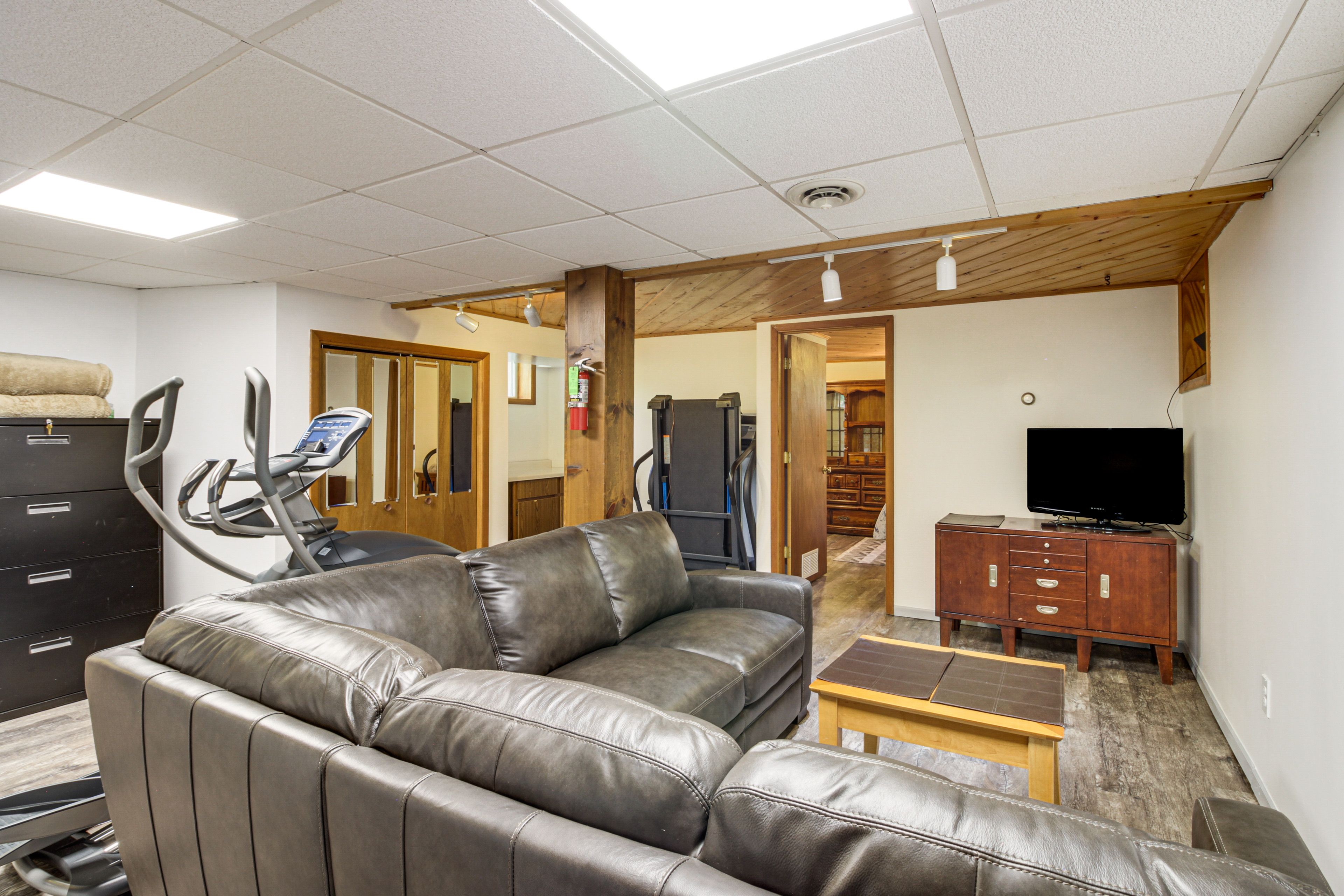 Downstairs Living Room | Central Heating & A/C | Lower Level