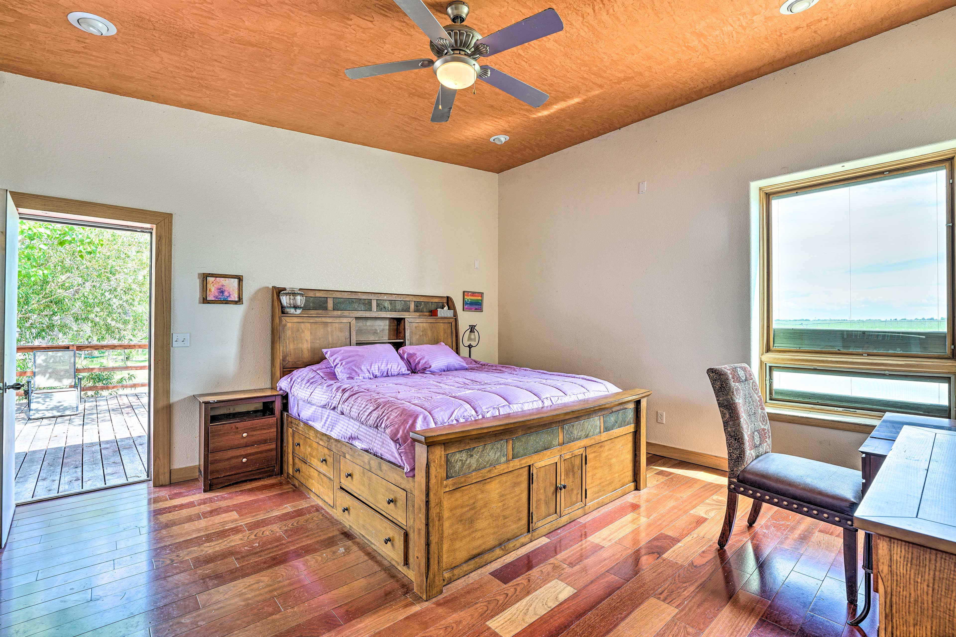 Bedroom 1 | King Bed | Linens & Towels | Deck Access | Full En-Suite Bathroom