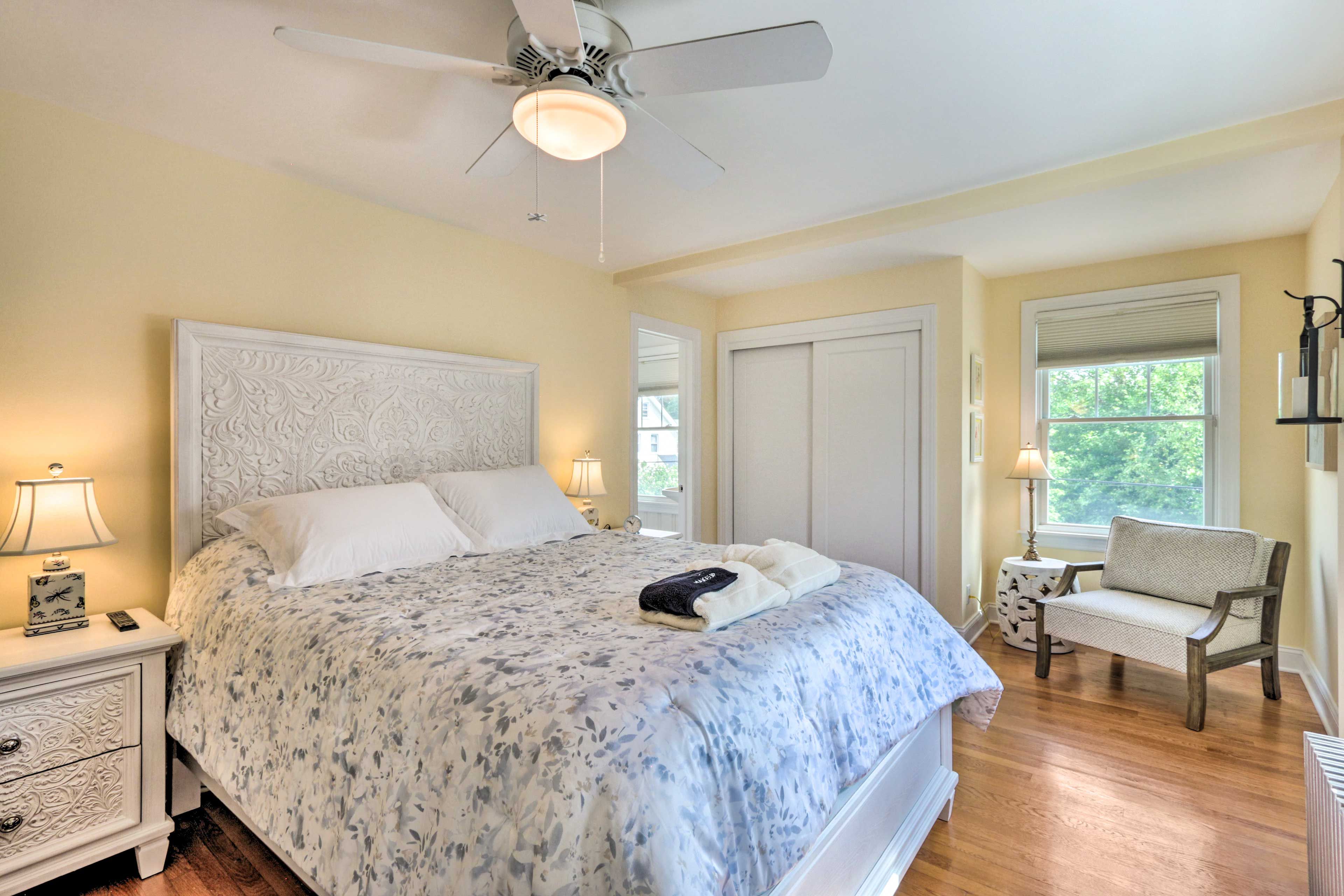 Bedroom 1 | Queen Bed | En-Suite Bathroom | Window A/C Unit | 2 Bath Robes