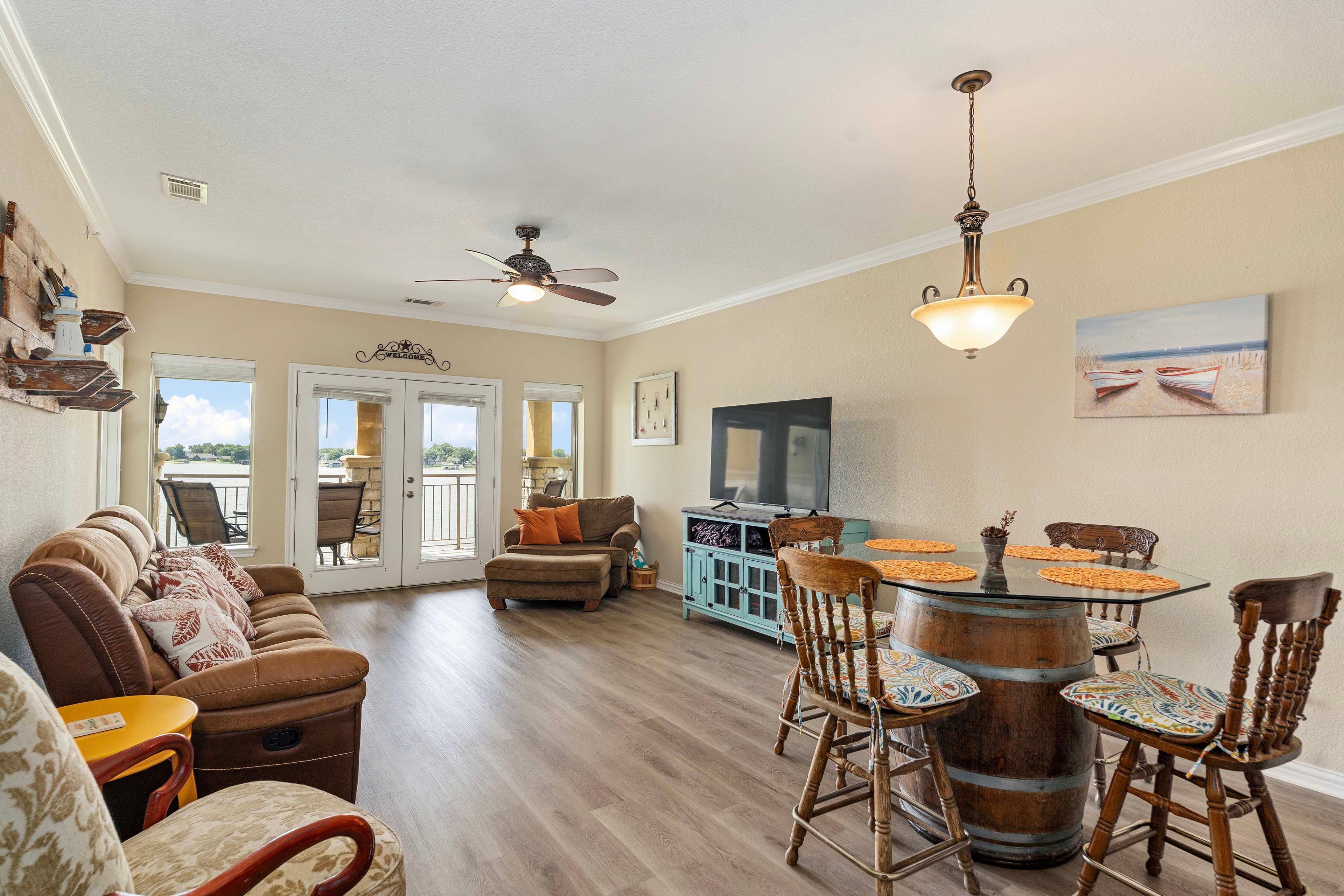 Dining Area | Dishware & Flatware Provided | Breakfast Bar w/ Additional Seating