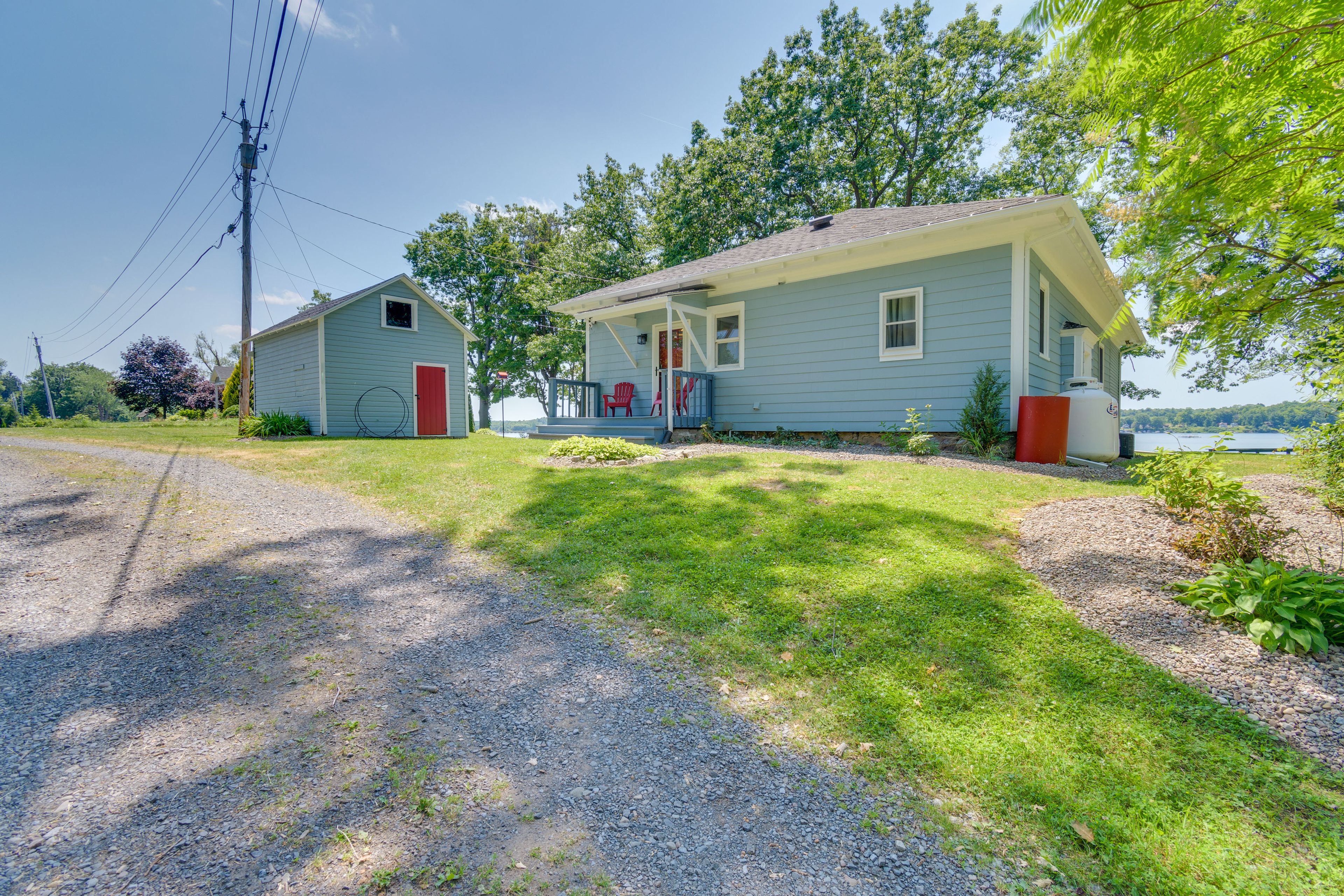 Property Exterior | Gravel Parking Area (4 Vehicles)