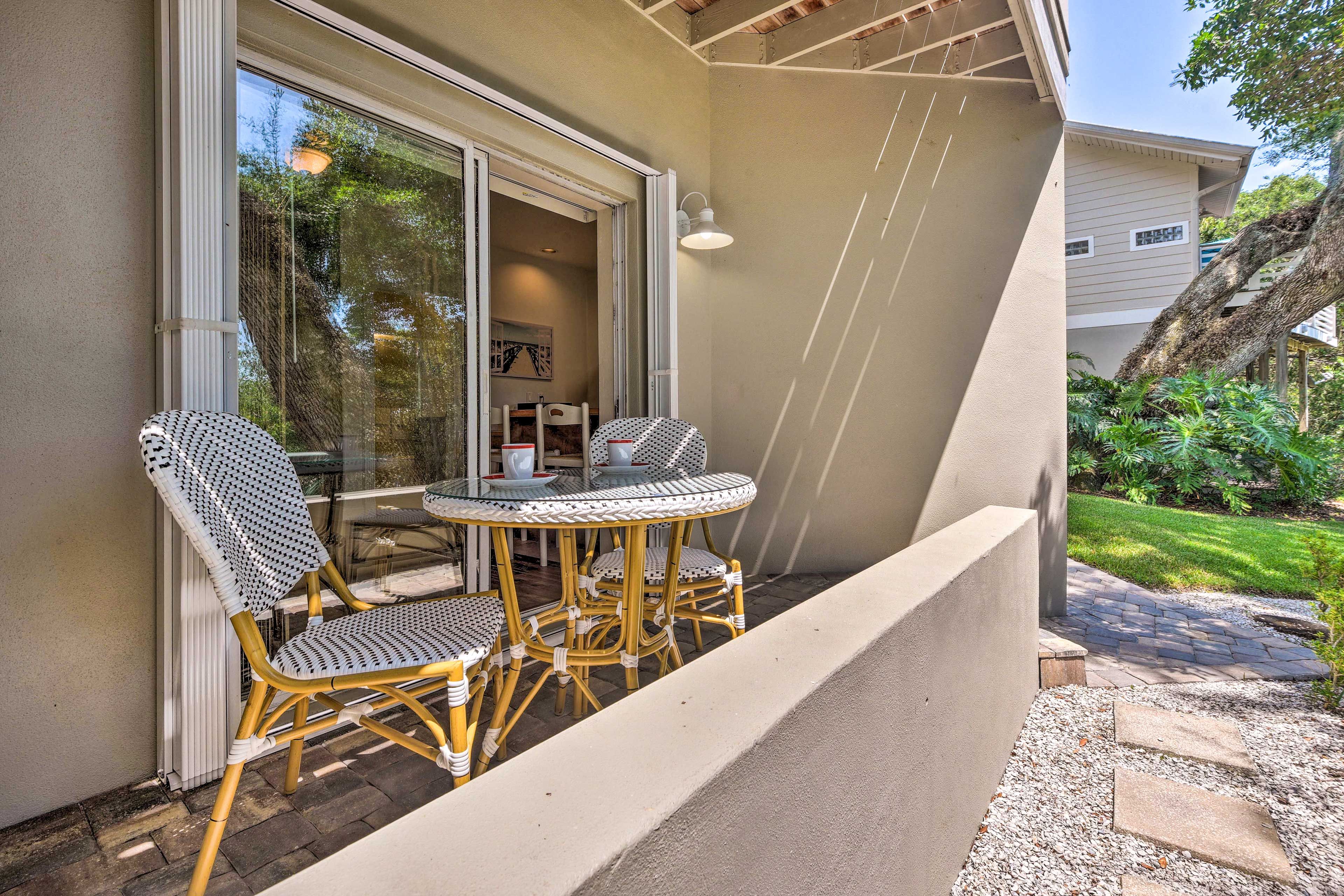 Apartment Exterior | Gas Grill | Shared Outdoor Shower | Walk to Beach