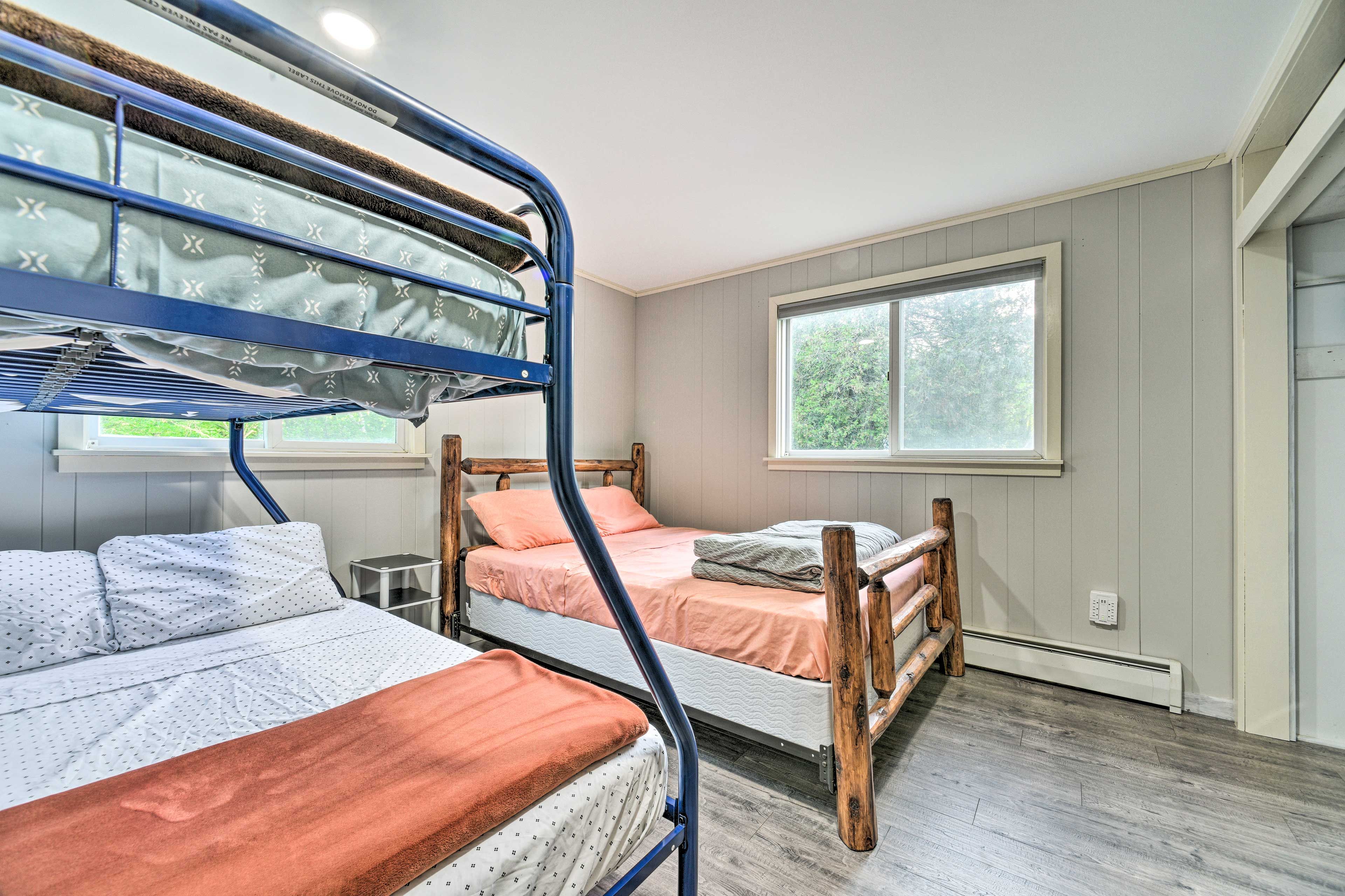 Bedroom 1 | Queen Bed, Twin/Full Bunk Bed | 1st Floor | Linens Provided