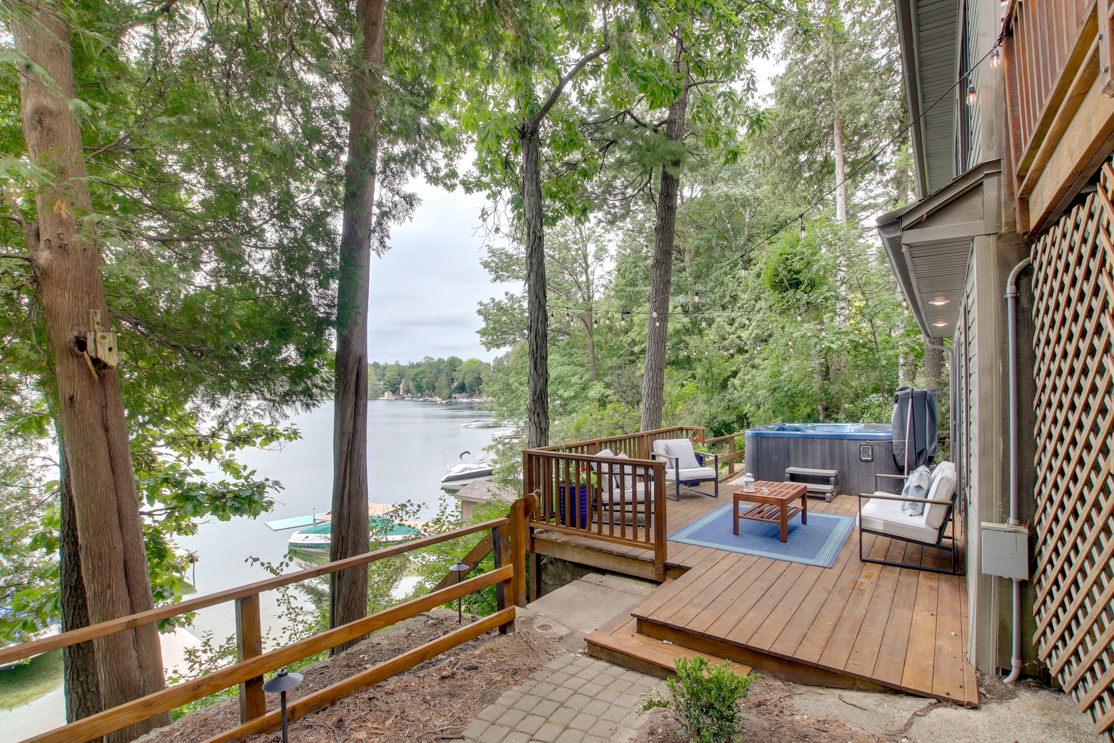 Cottage Exterior | Lower Furnished Deck | Private Hot Tub