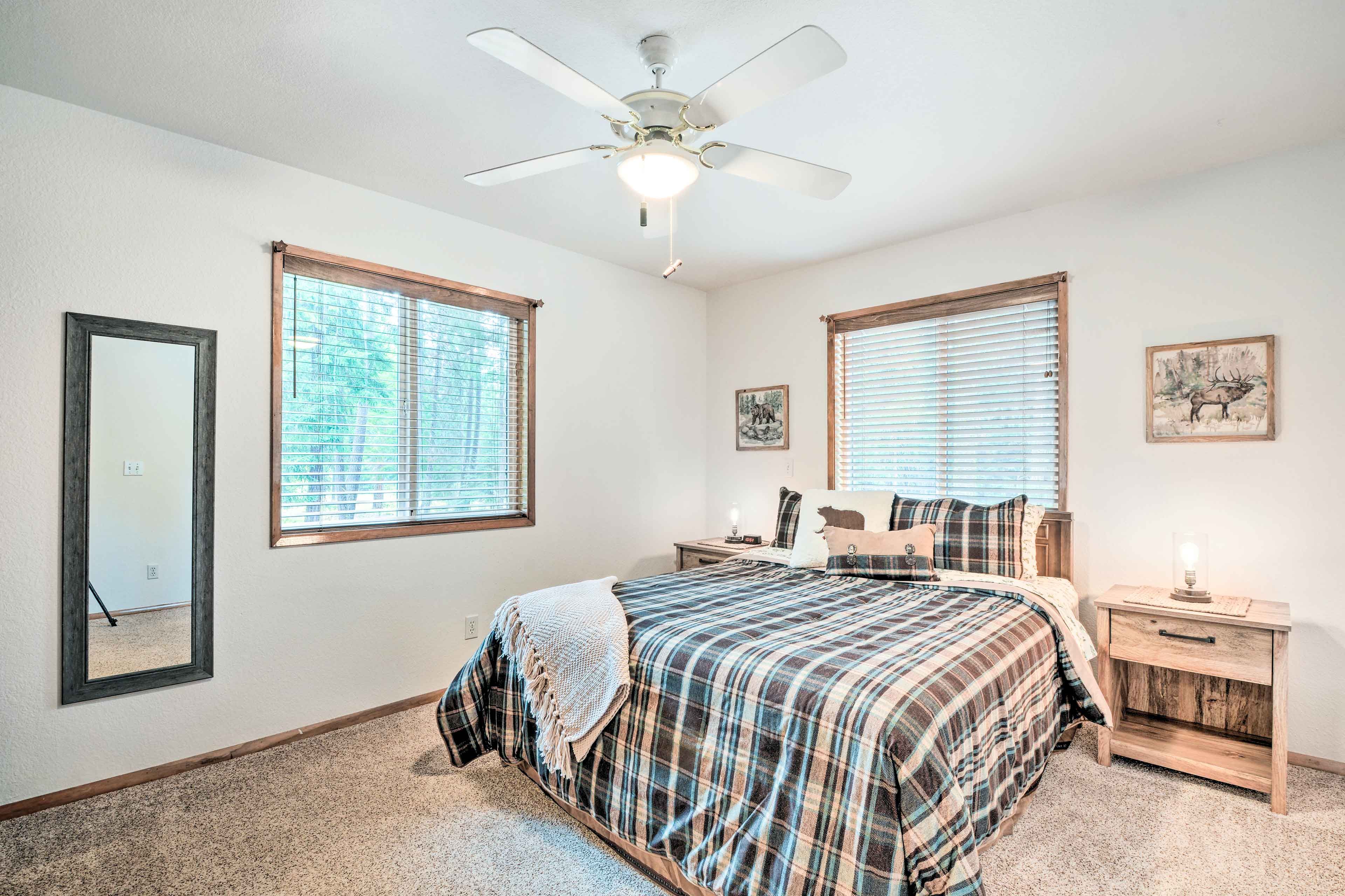 Bedroom 1 | Queen Bed | Main Level | Flat-Screen TV | Walk-In Closet