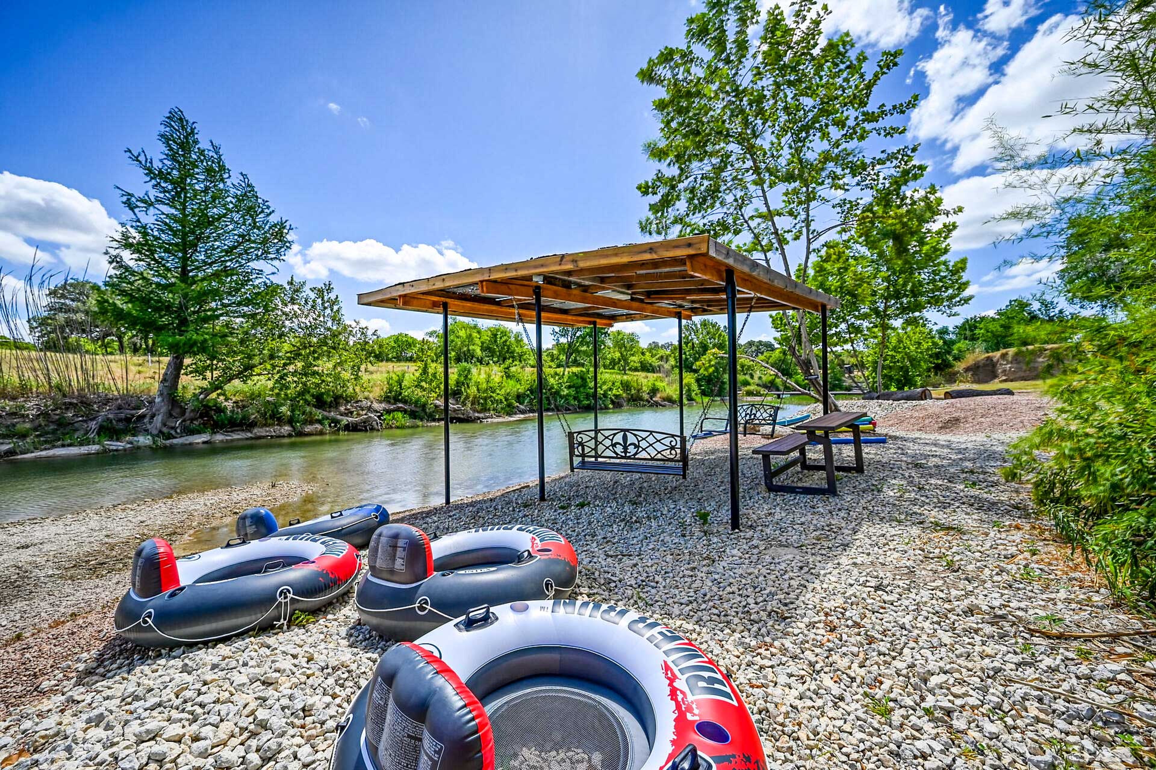 River-Front Patio | River Floaties | Canoes | Paddle Boards | Life Vests