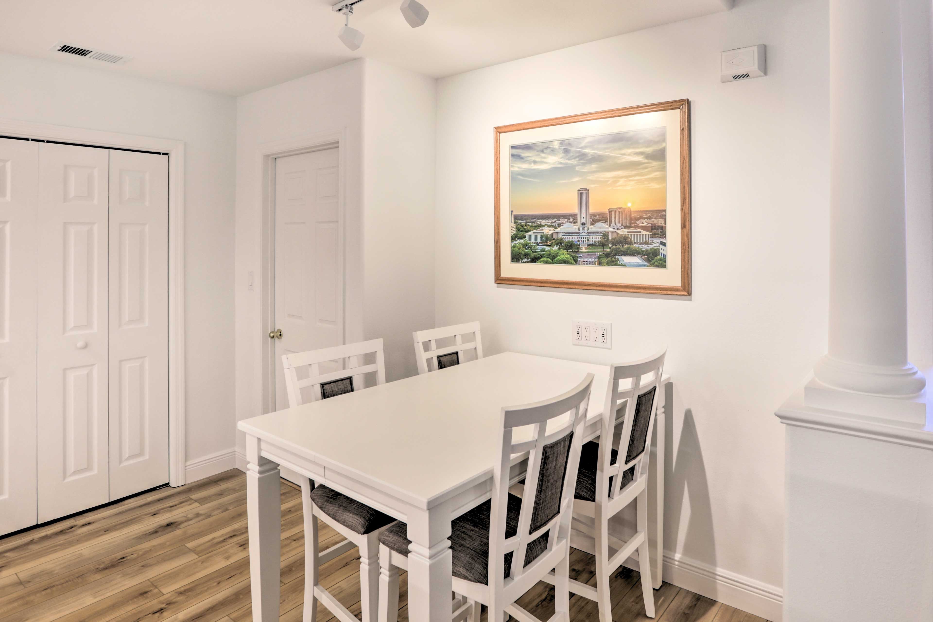 Dining Area | Dishware & Flatware Provided | Breakfast Bar w/ Additional Seating