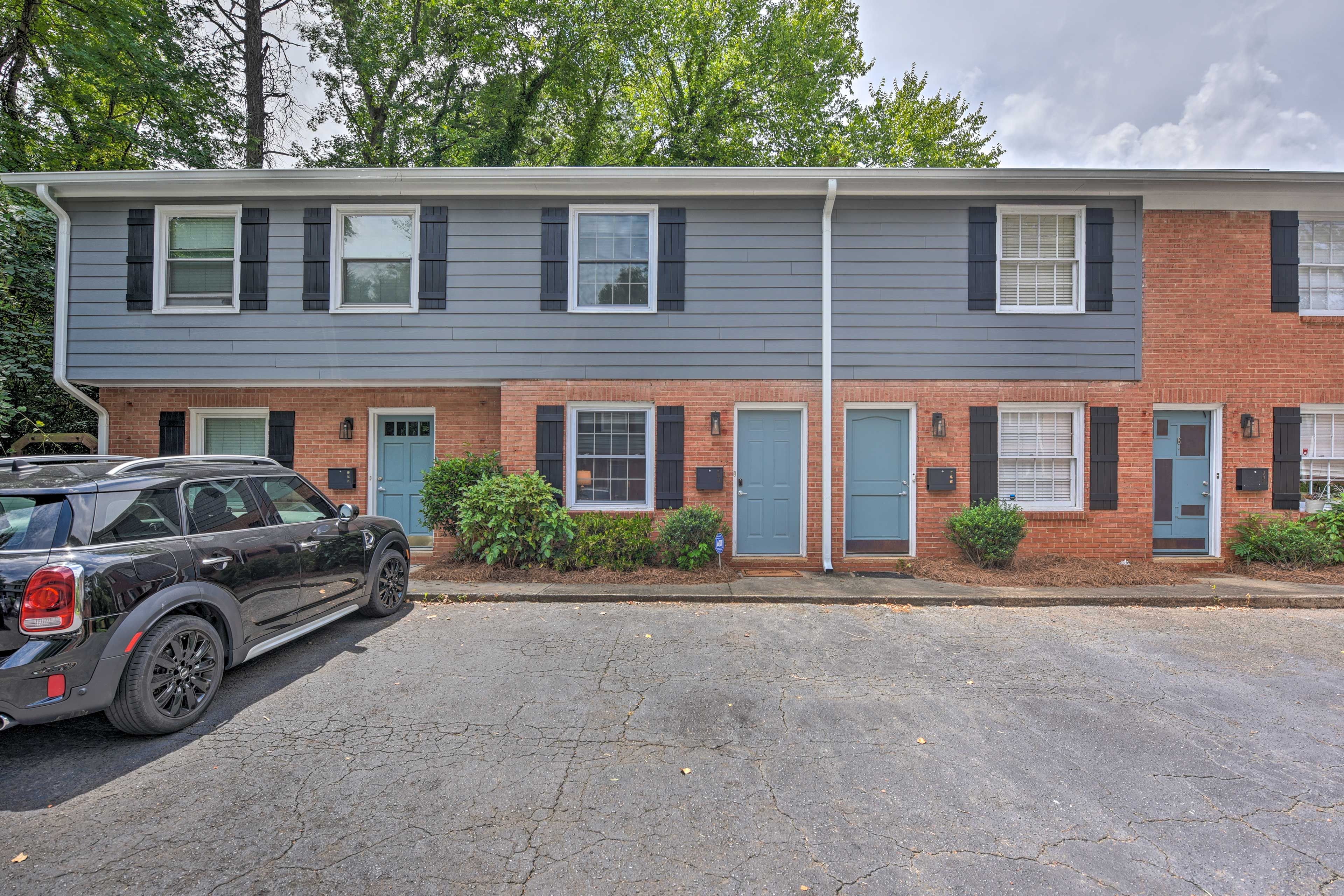 Property Exterior | Community Parking Lot (First-Come, First-Served)