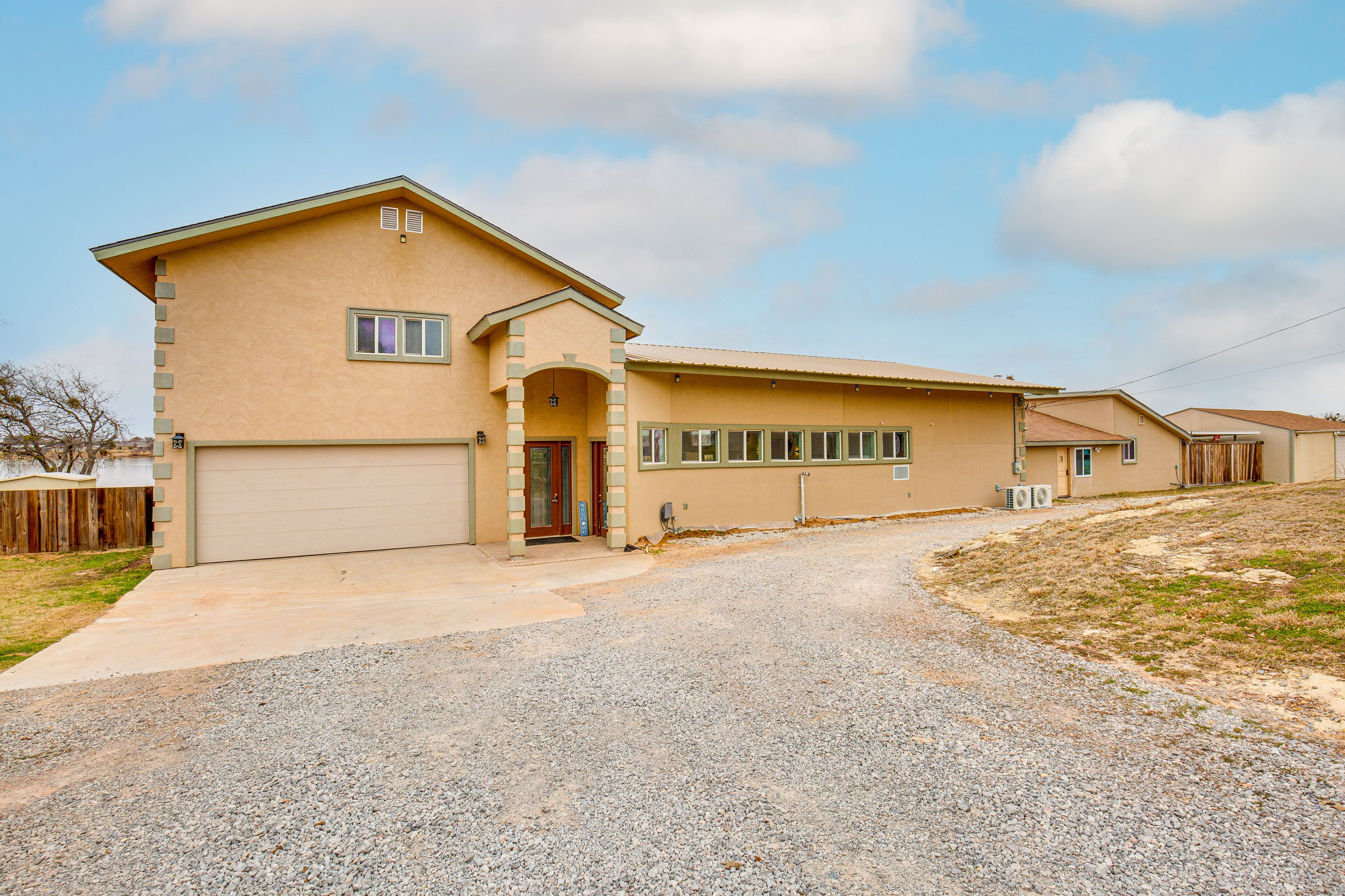 Exterior | Gravel Driveway (2 Vehicles) | Garage (2 Vehicles)