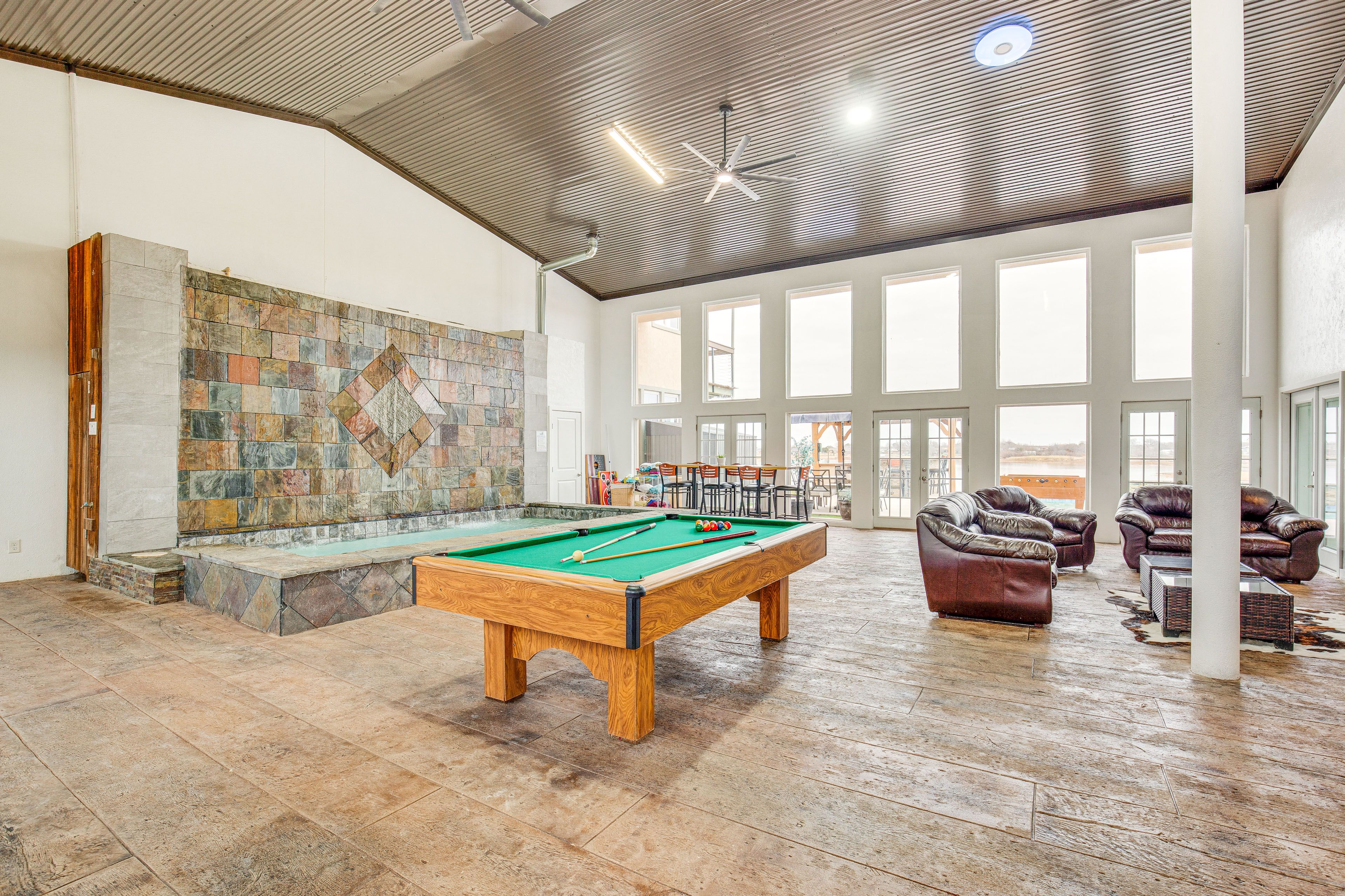 Atrium | Pool Table | Foosball Table | Bar Seating | Sauna | Hot Tub