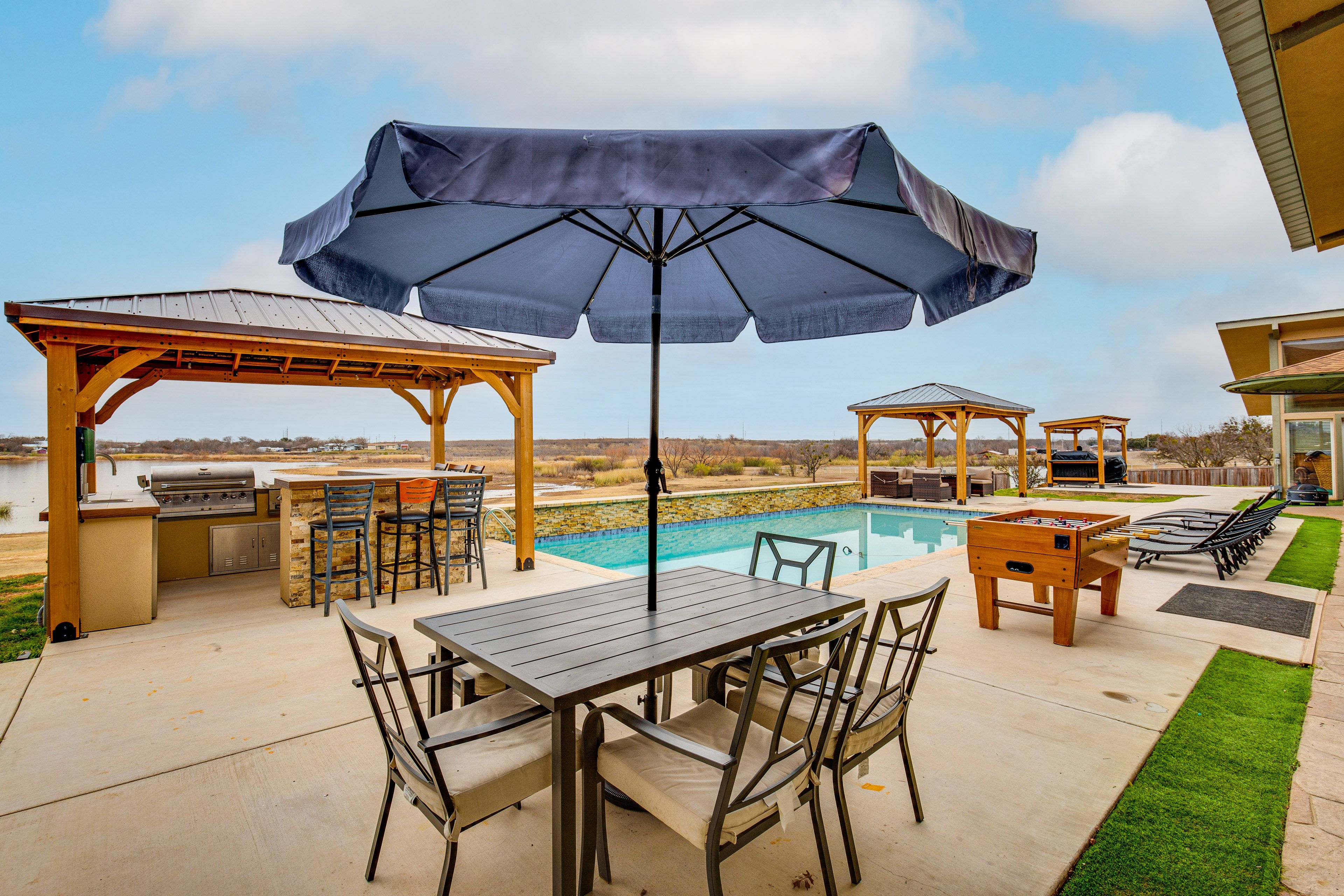 Furnished Patio | Outdoor Pool | Lake Views | Charcoal Grill