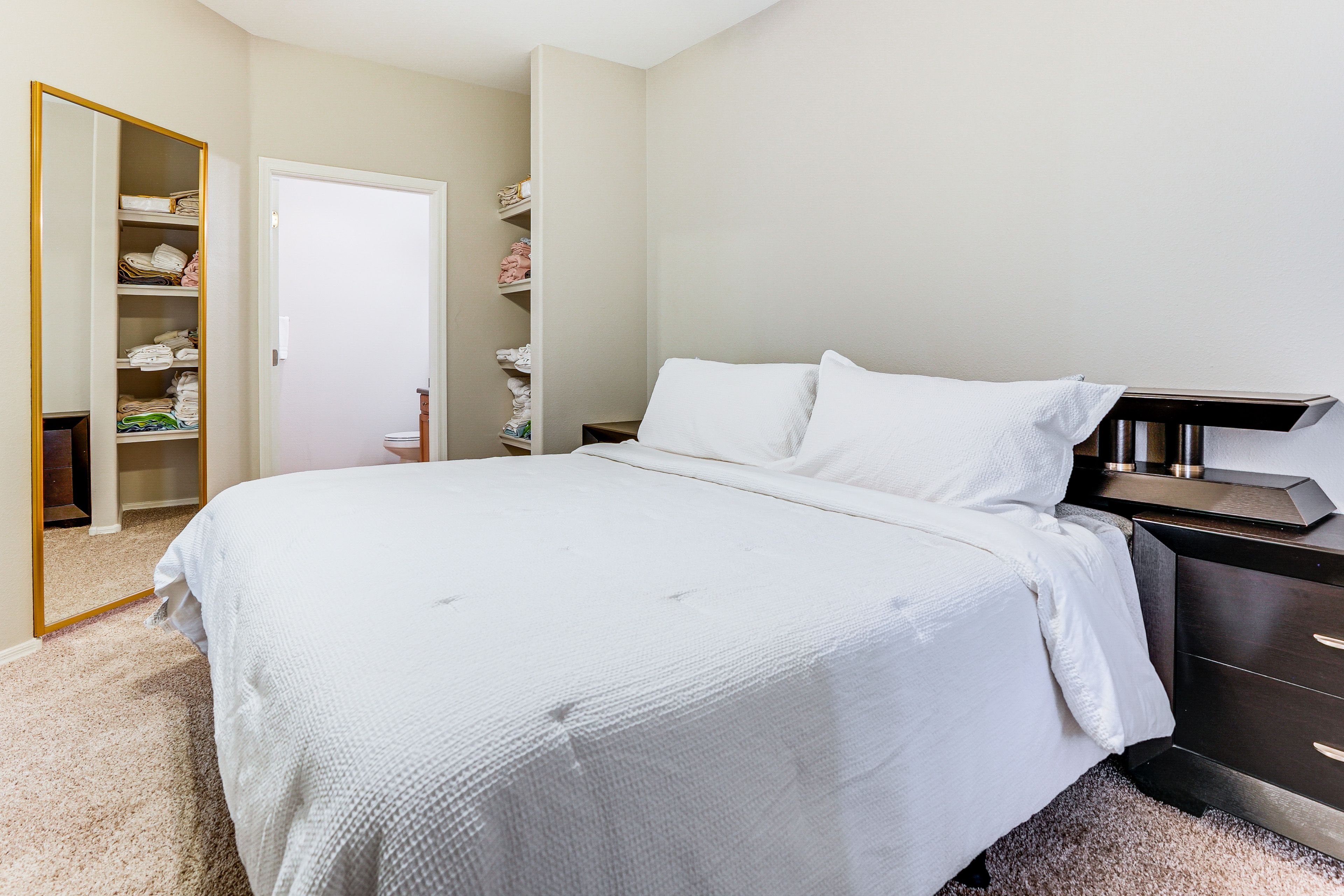 Bedroom 1 | King Bed | Linens & Towels | Balcony Access | Full En-Suite Bathroom
