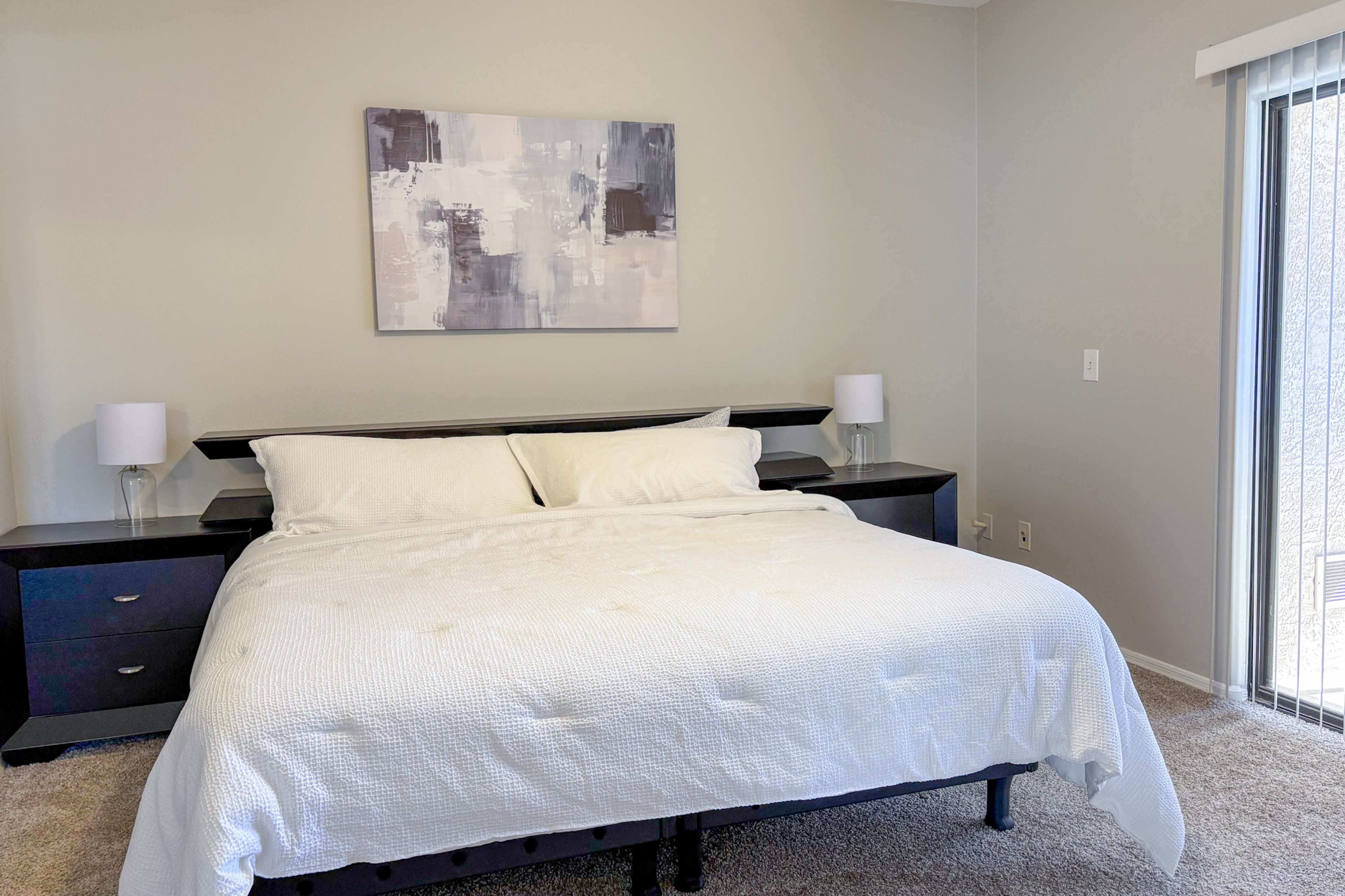 Bedroom 1 | King Bed | Linens & Towels | Balcony Access | Full En-Suite Bathroom
