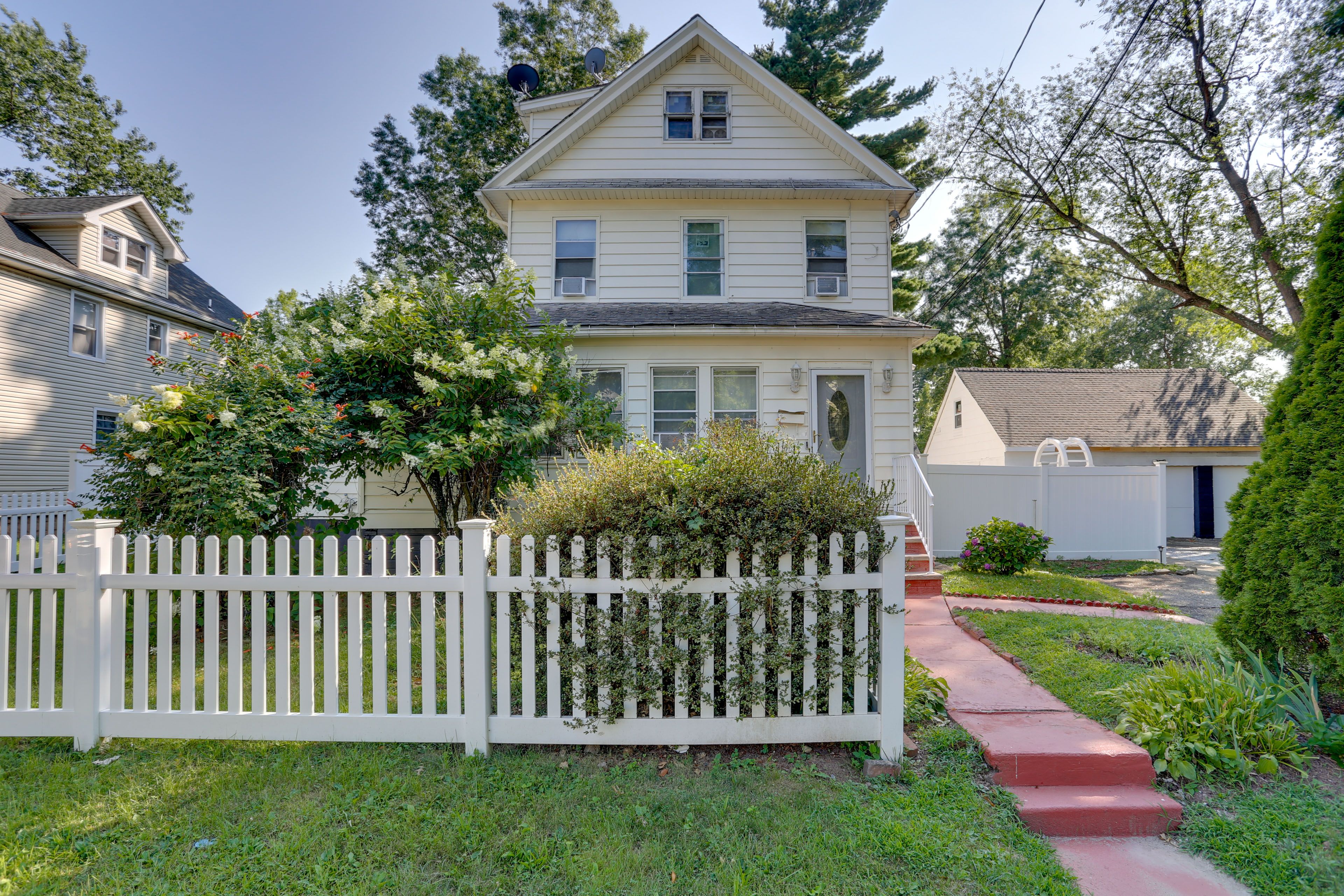 Duplex Exterior | Walkable Neighborhood | Easy Highway Access