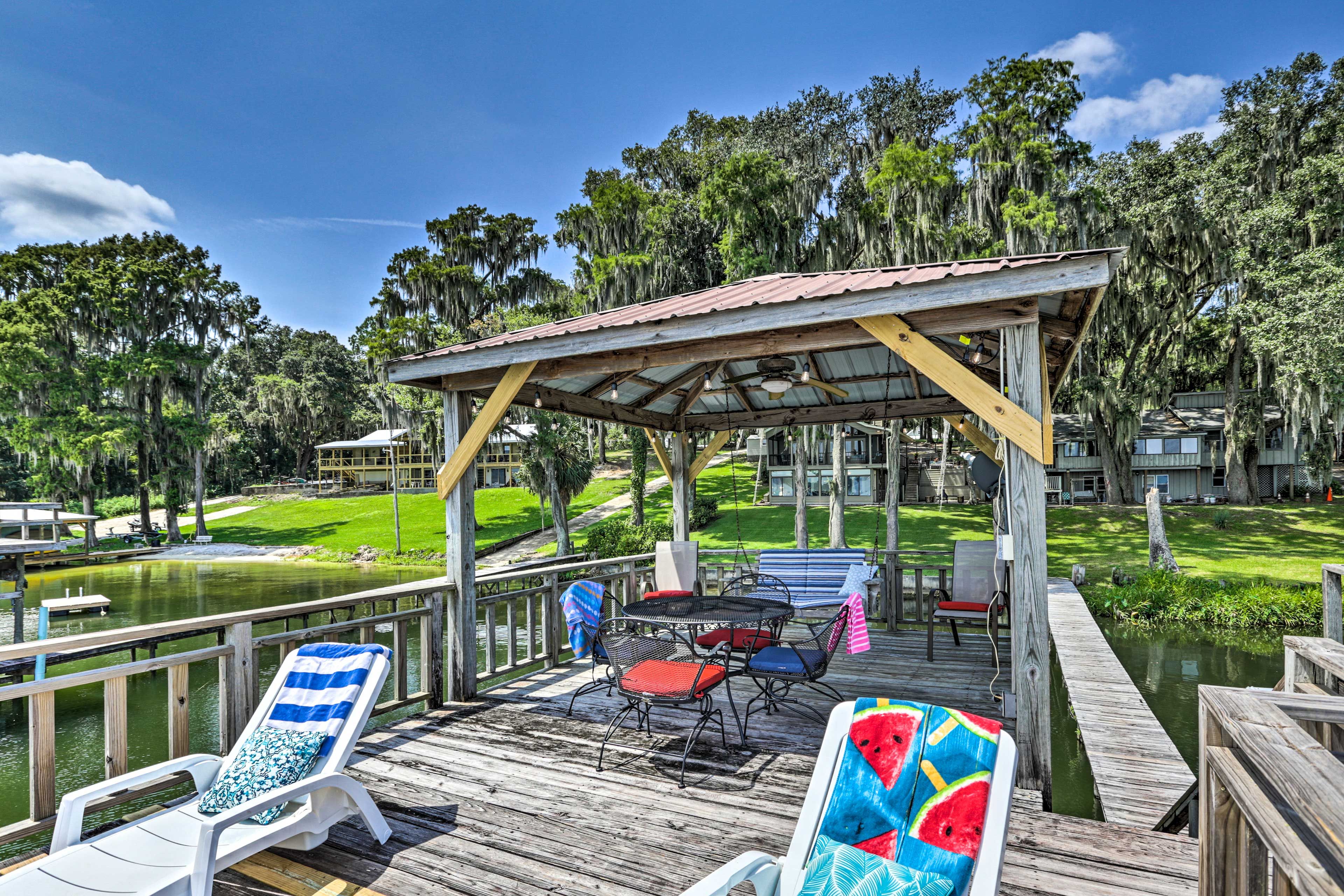 Boat Dock | Top Level | Lounge Seating | Dining Area | Swing | Ceiling Fans