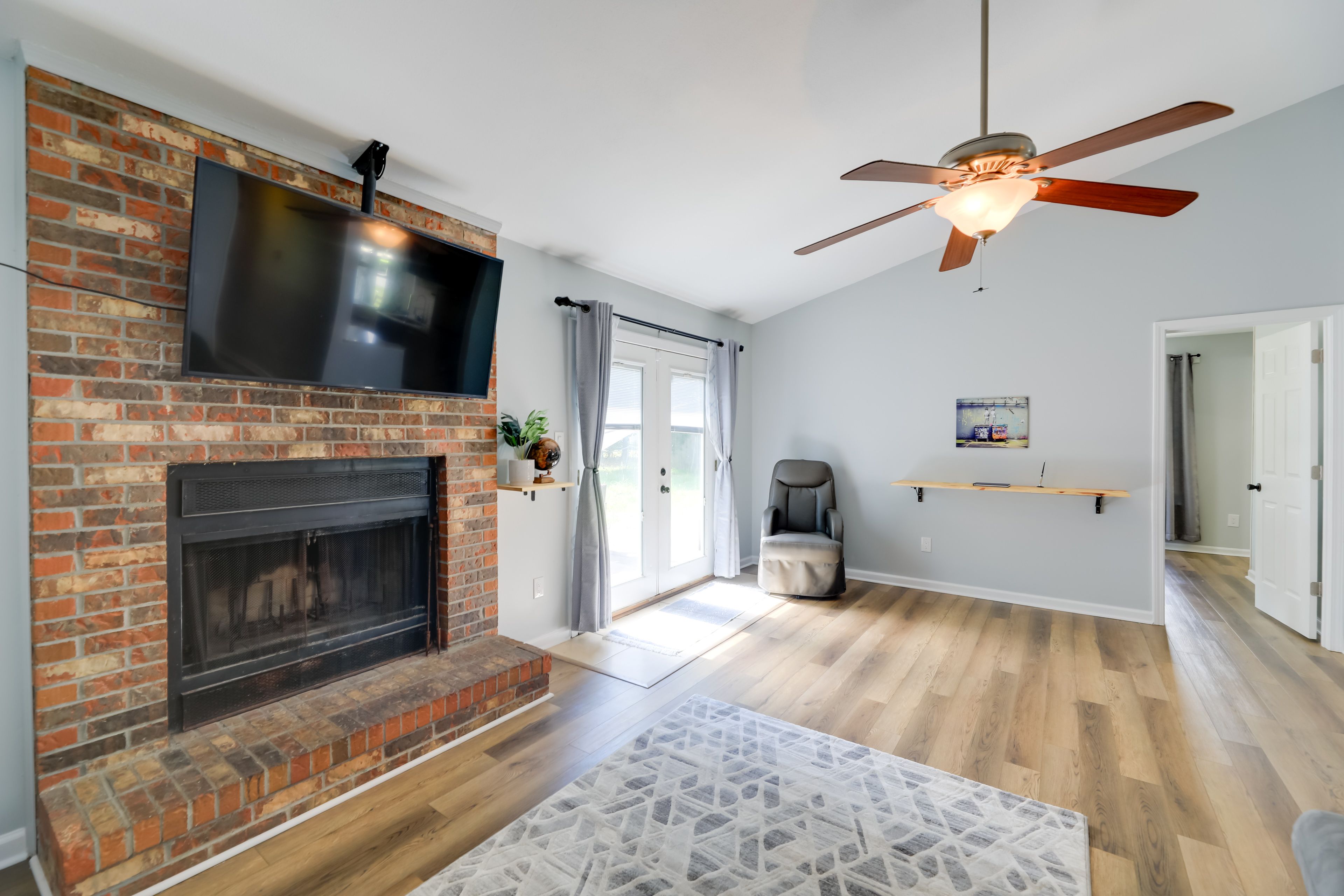 Living Room | Smart TV | Wood-Burning Fireplace | Laptop-Friendly Workspace
