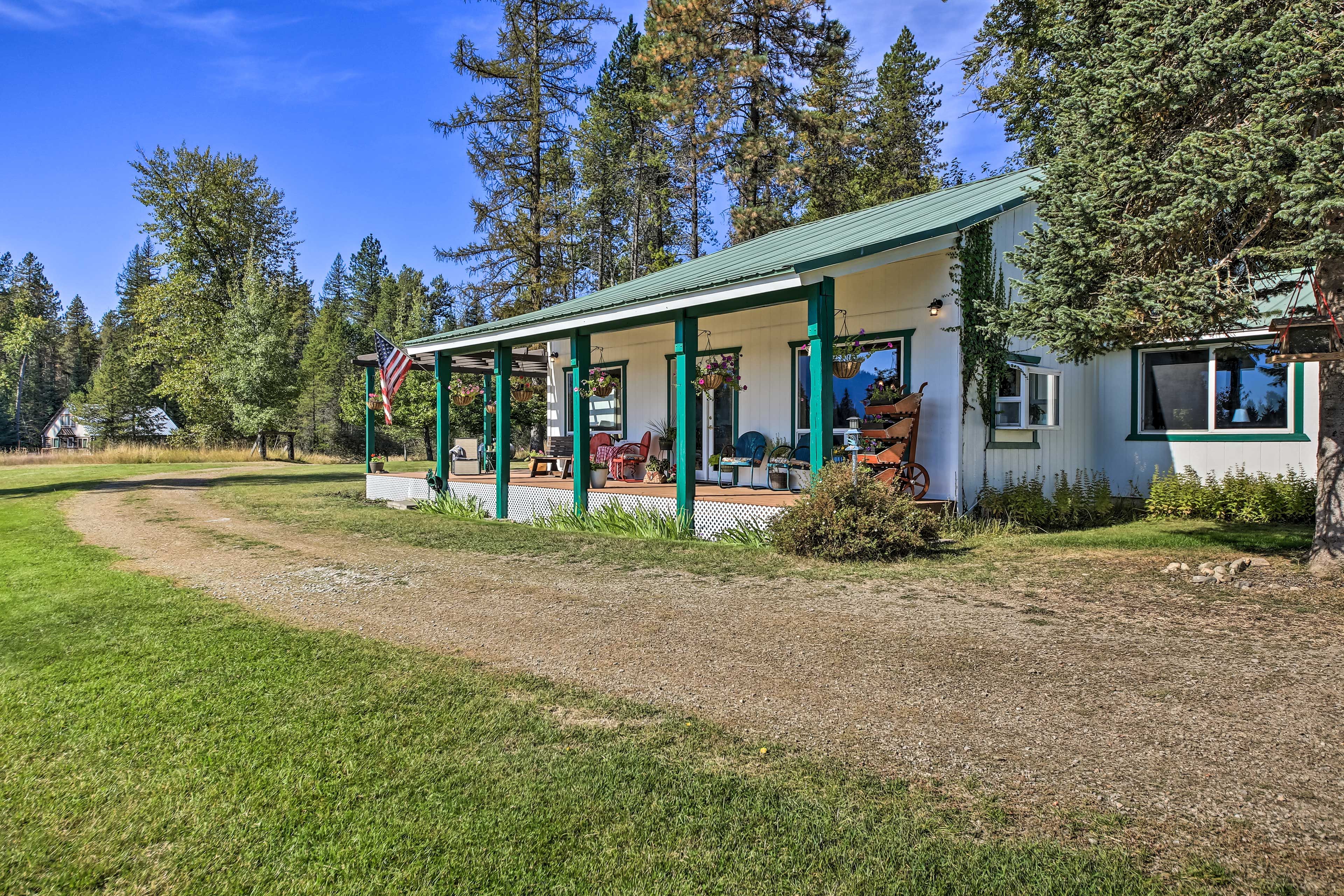Home Exterior | Grass Parking Area (10 Vehicles) | Garage Parking (2 Vehicles)