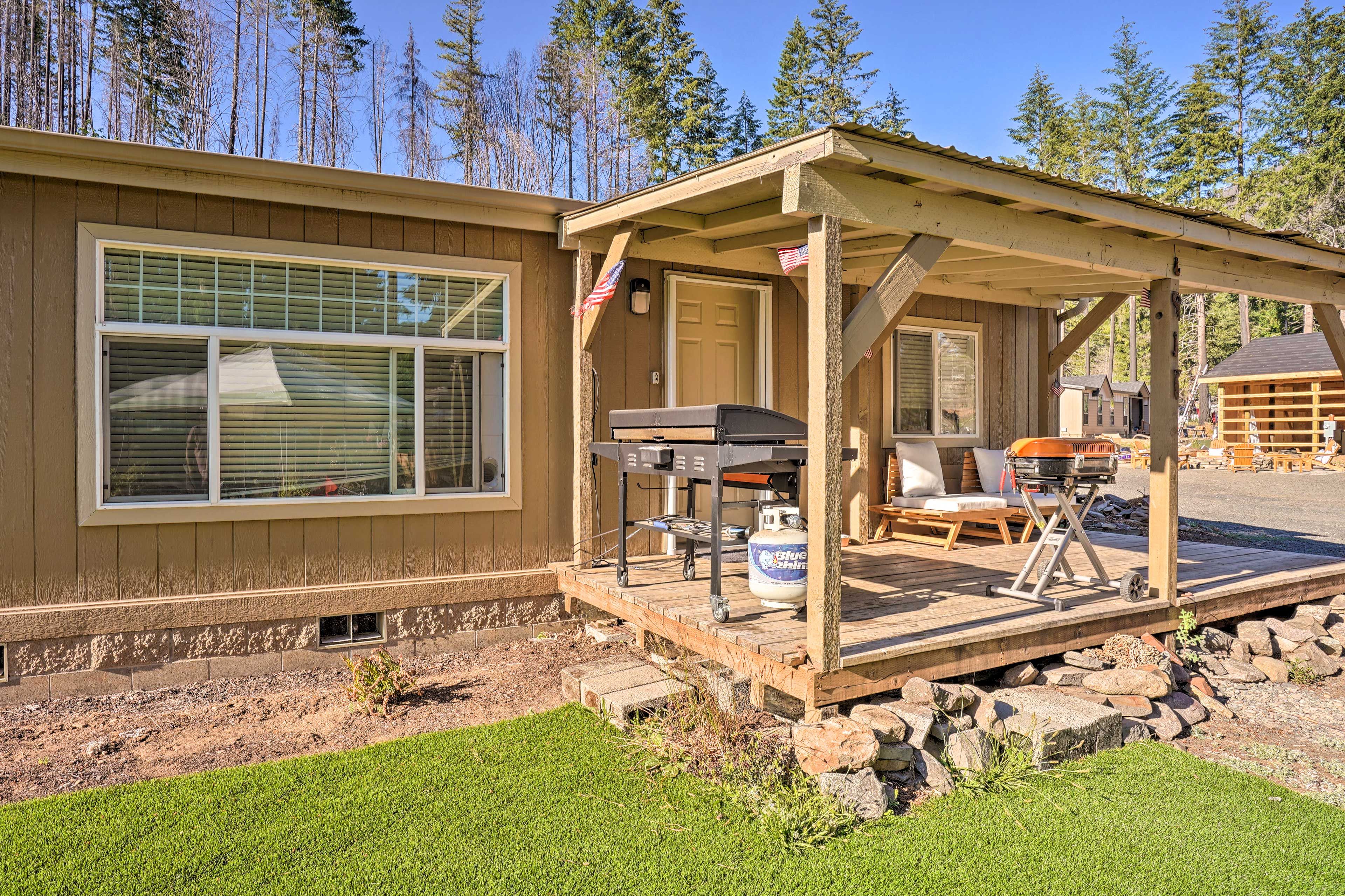 House Exterior | Furnished Deck | Charcoal Grill | Gas Grill