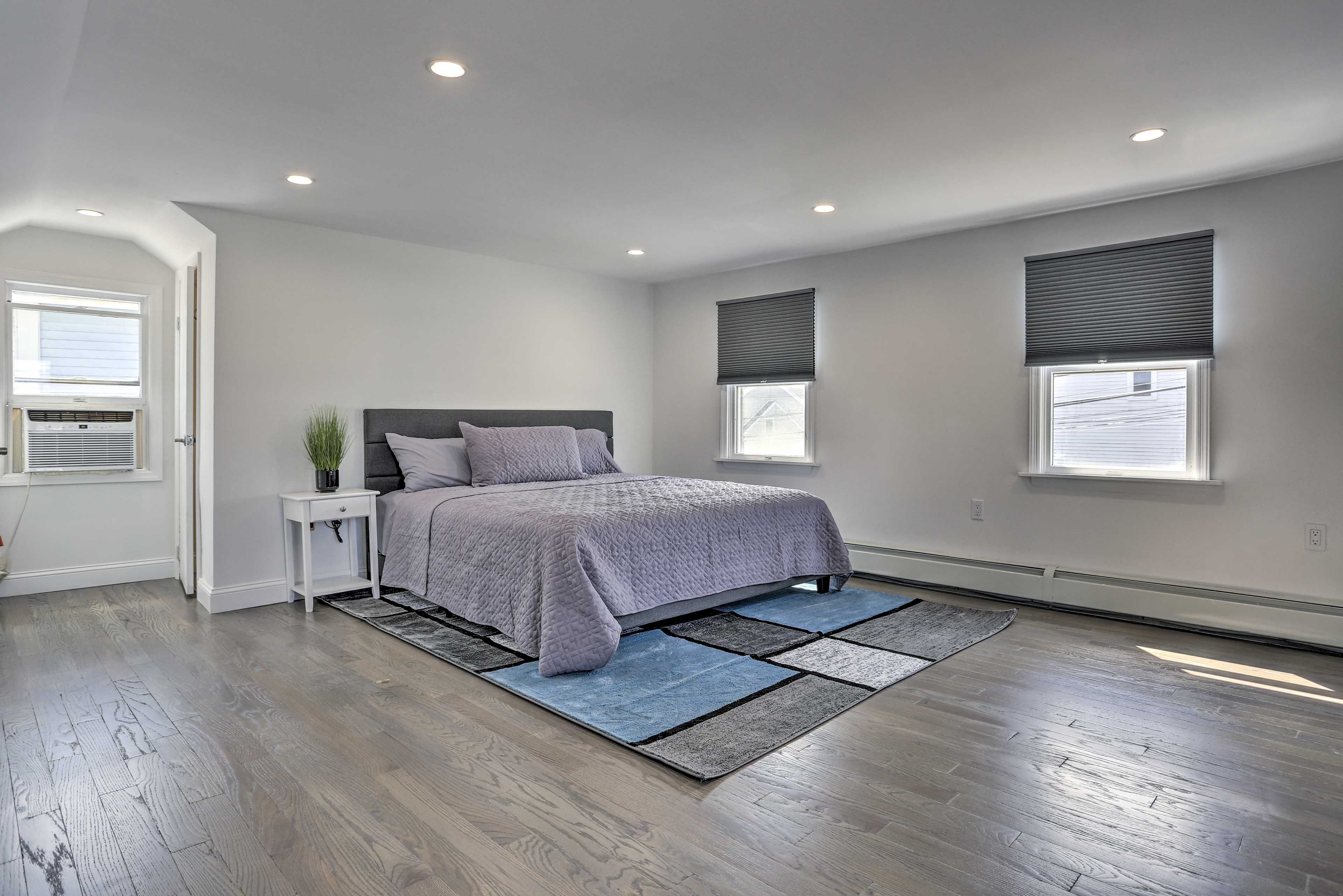 Bedroom 1 | 2nd Floor | Window A/C Unit | 75" Smart TV | Linens Provided