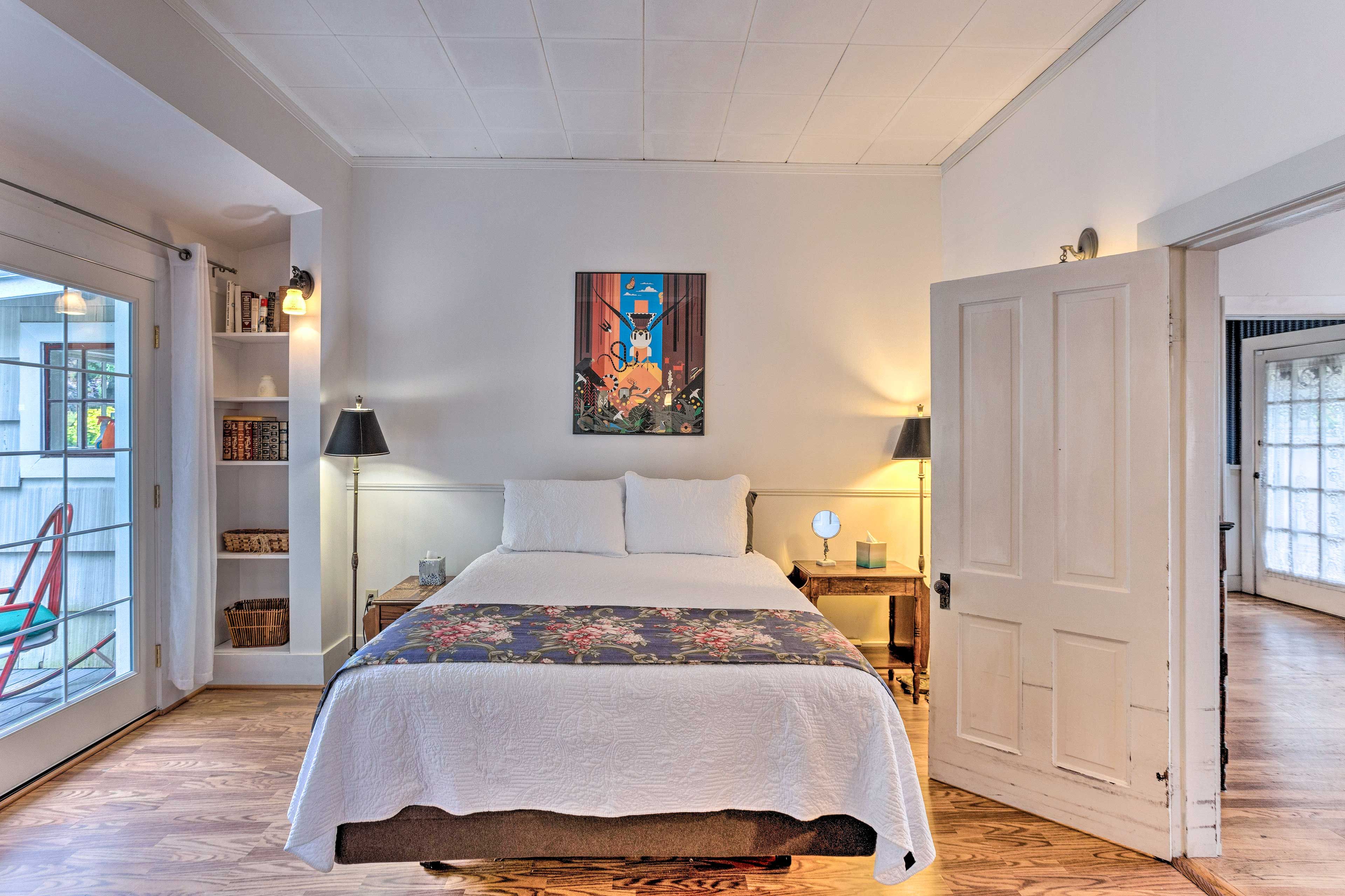 Bedroom 1 | Queen Bed | Linens Provided | Deck Access | 1st Floor