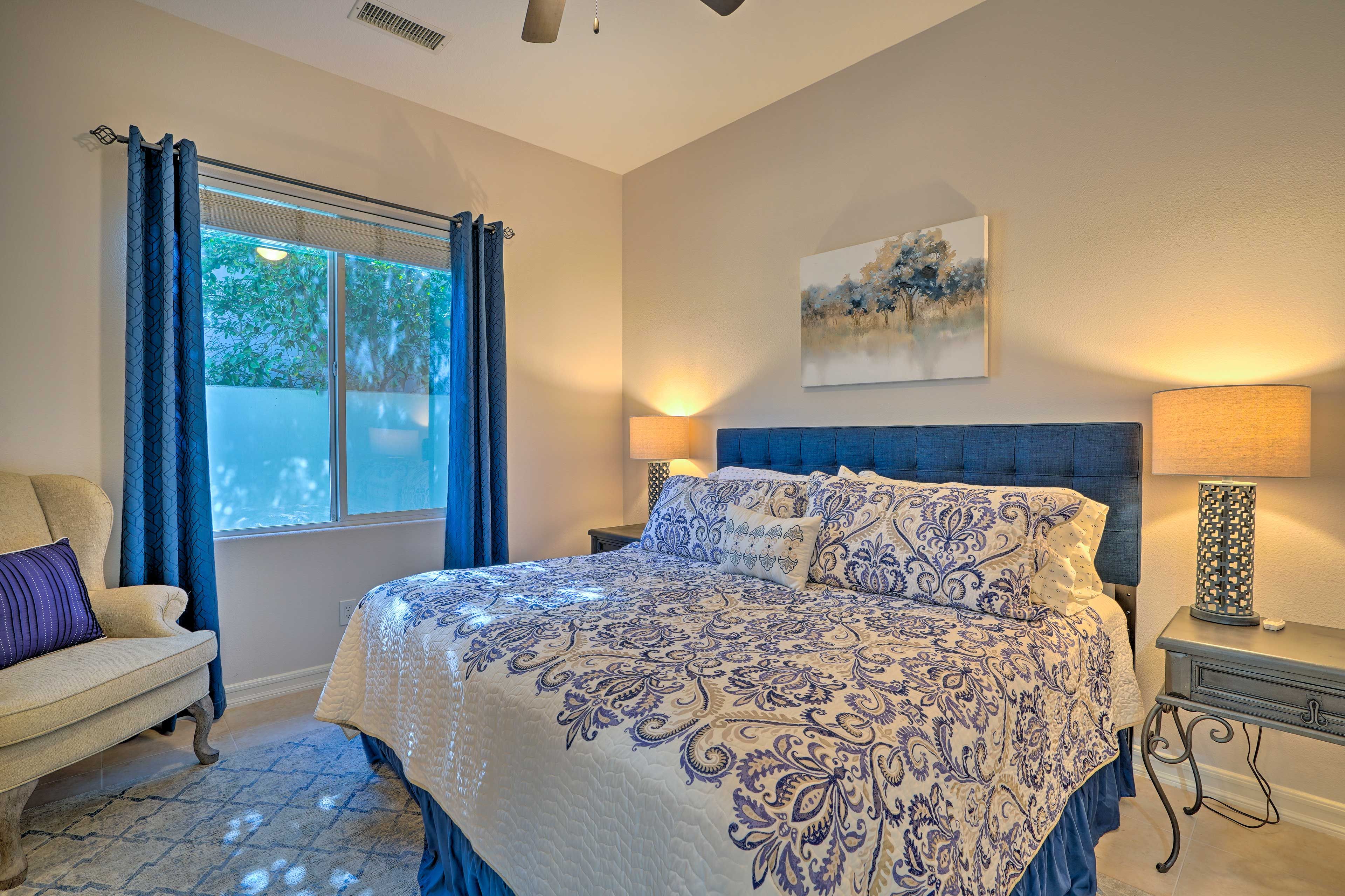 Bedroom 2 | King Bed | Seating | Linens Provided | En-Suite Bathroom