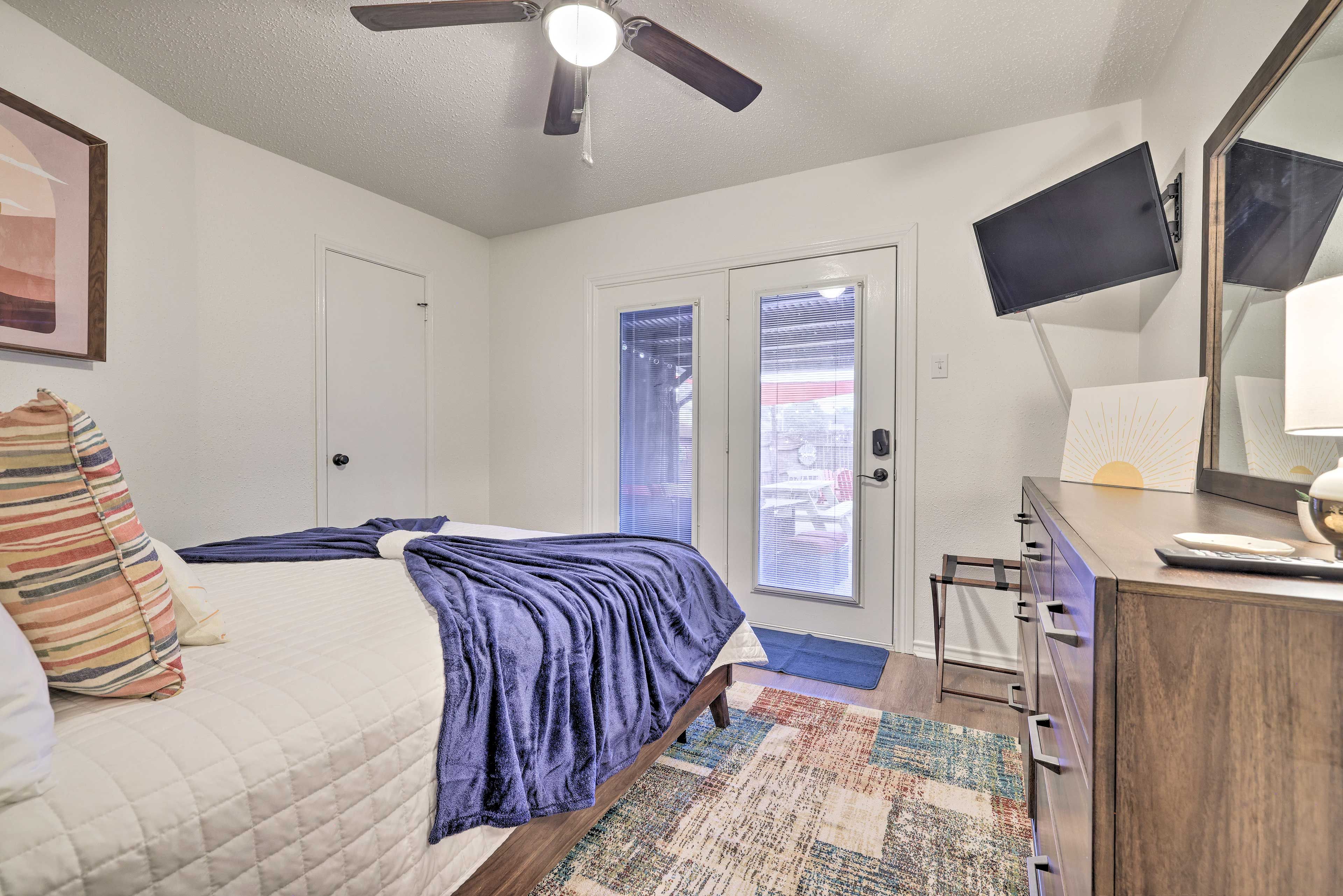 Bedroom 2 | Queen Bed | 32″ Smart TV | Access to Backyard