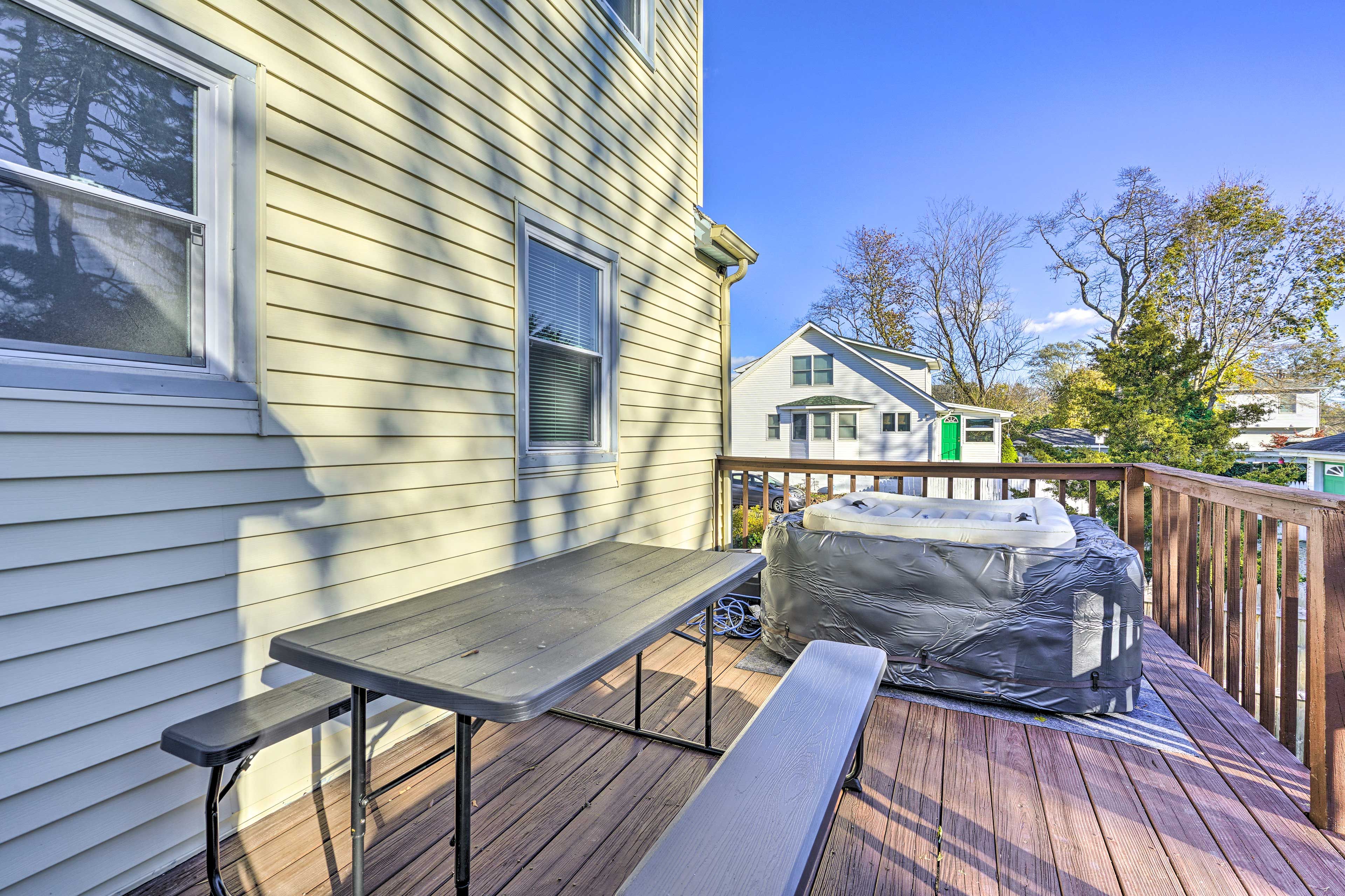 Deck | Outdoor Seating Area | Private Hot Tub Not Available for Guest Use